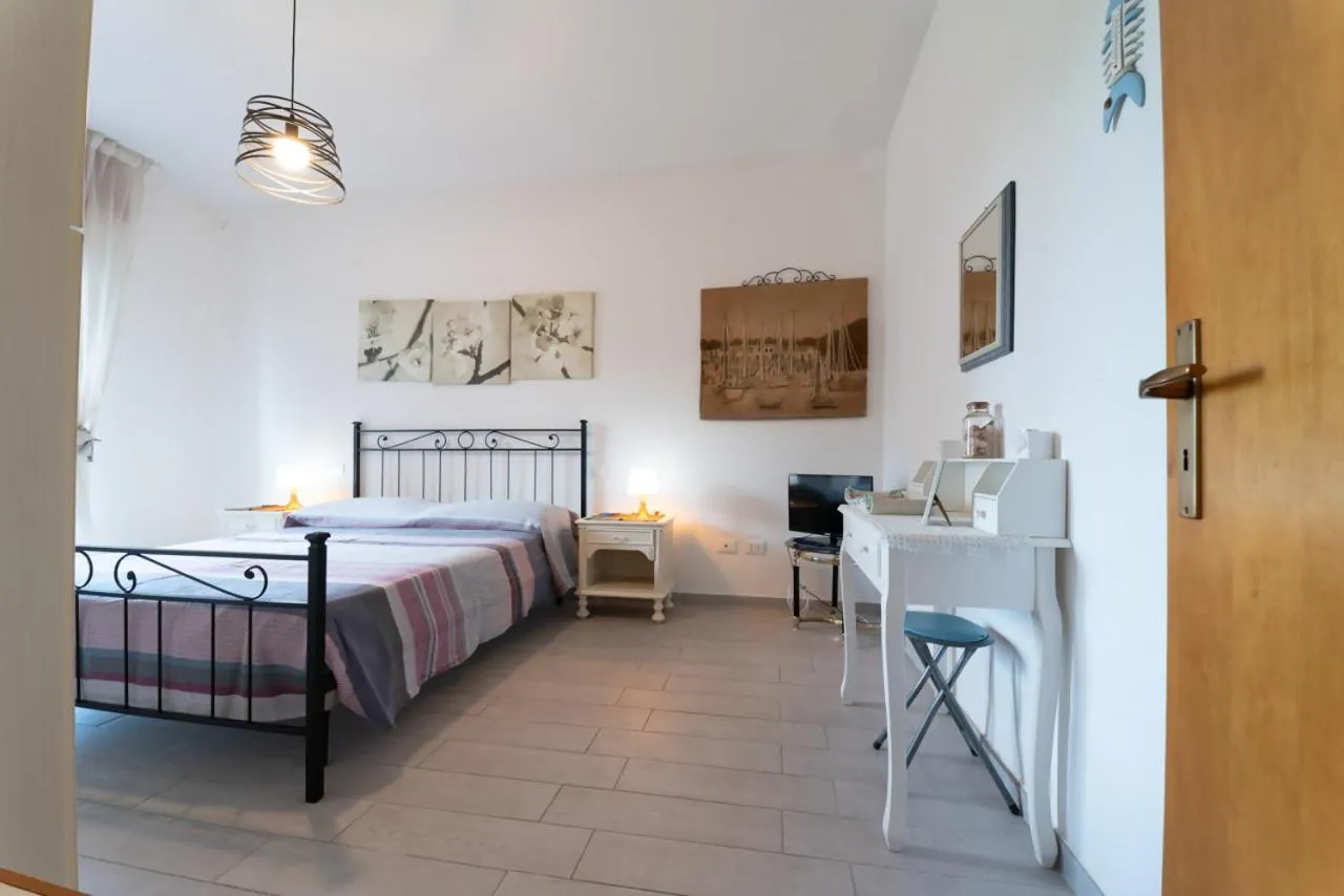 Bed in AZZURRO LIDO ADRIANO VISTA MARE