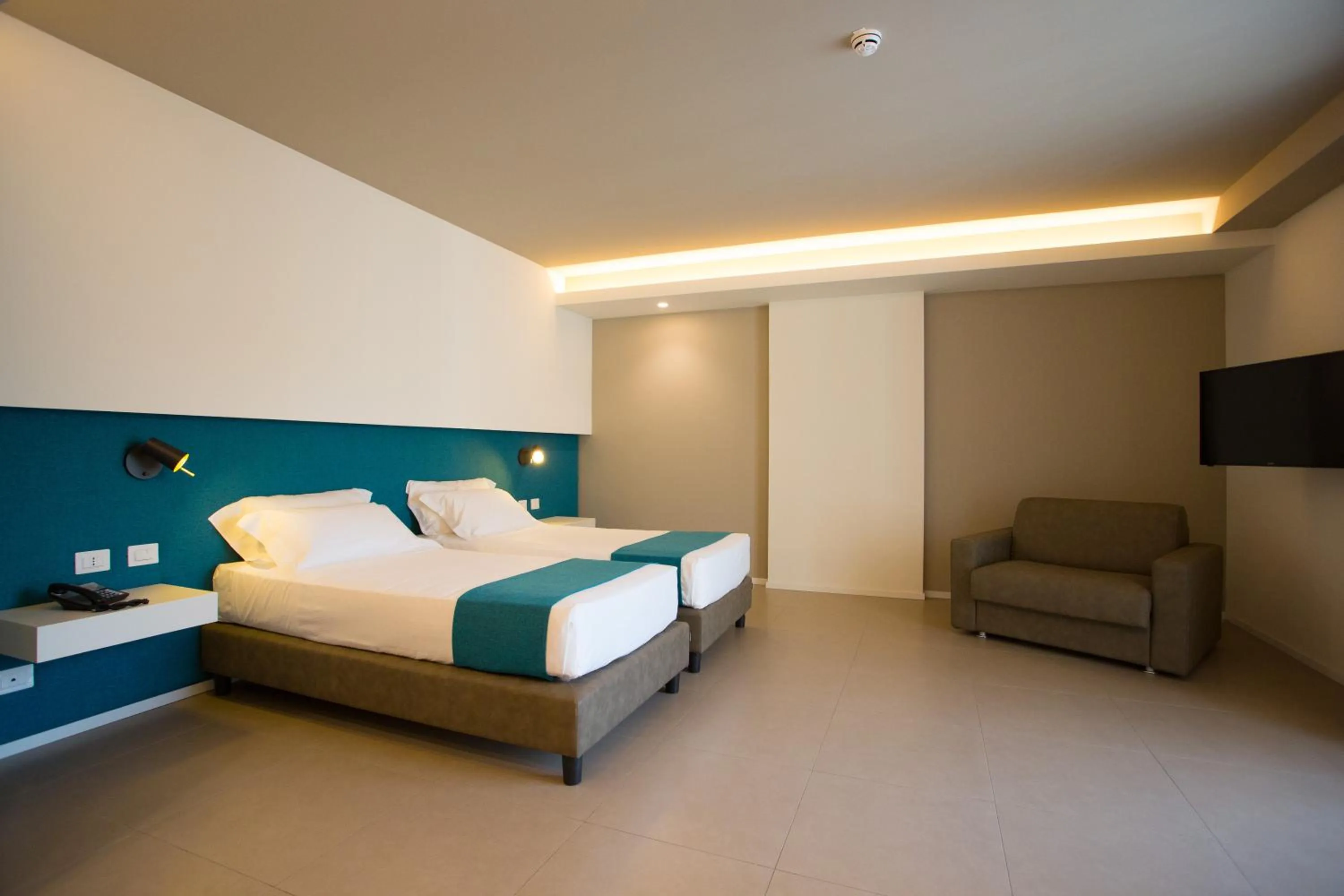 Bed in Airone City Hotel