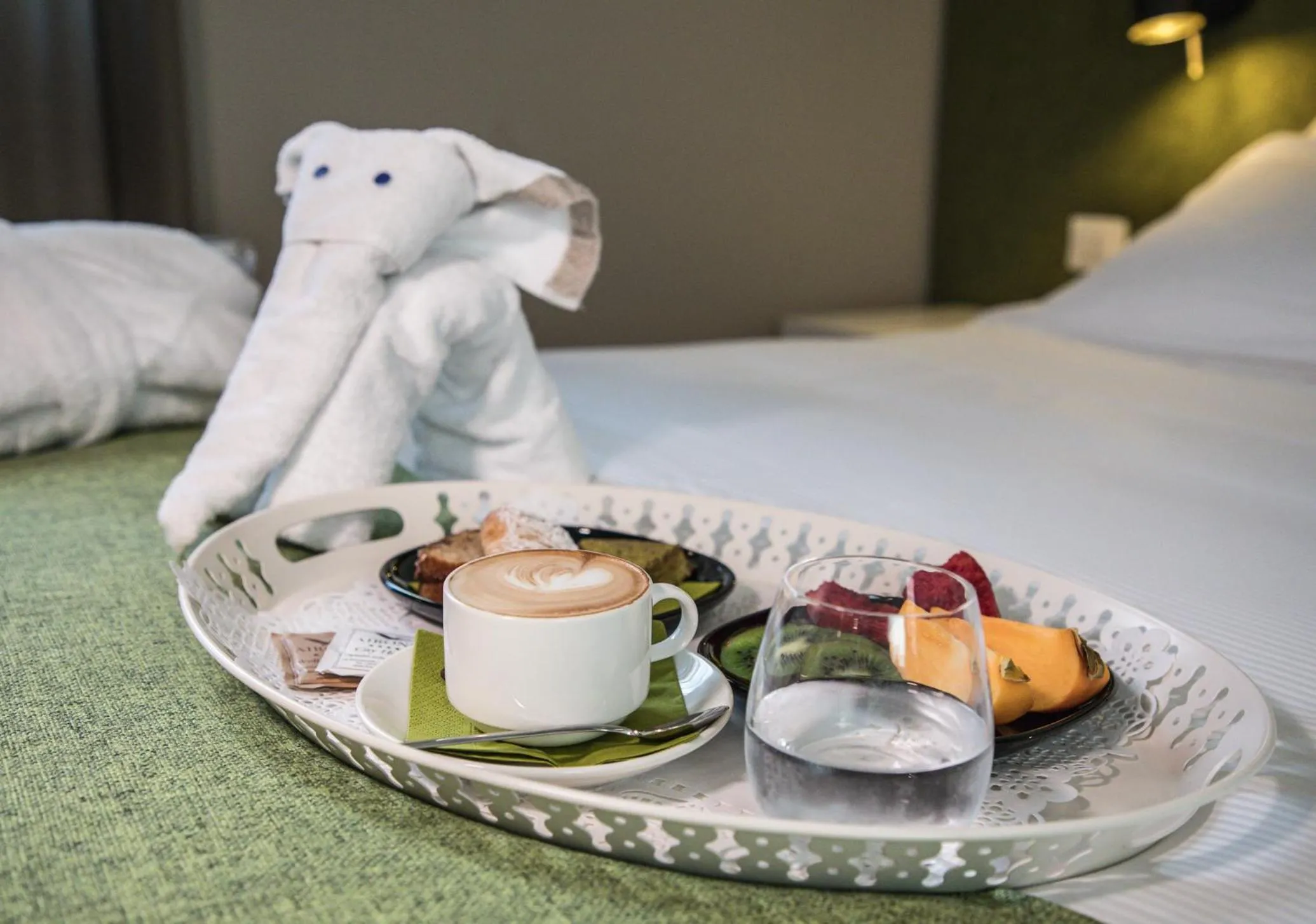 Decorative detail, Bed in Airone City Hotel