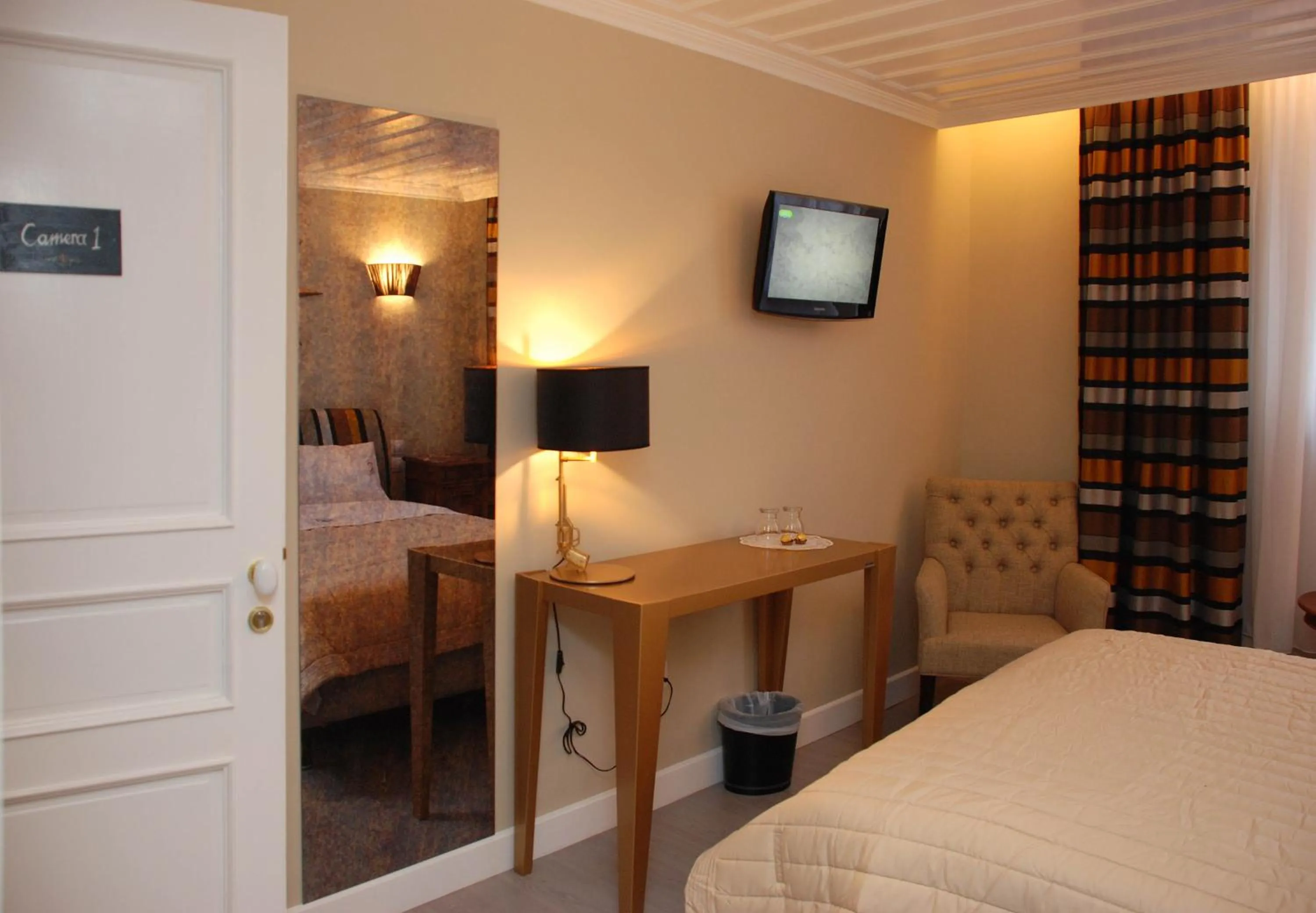 Bed in il Palazzo Rooms & Suites