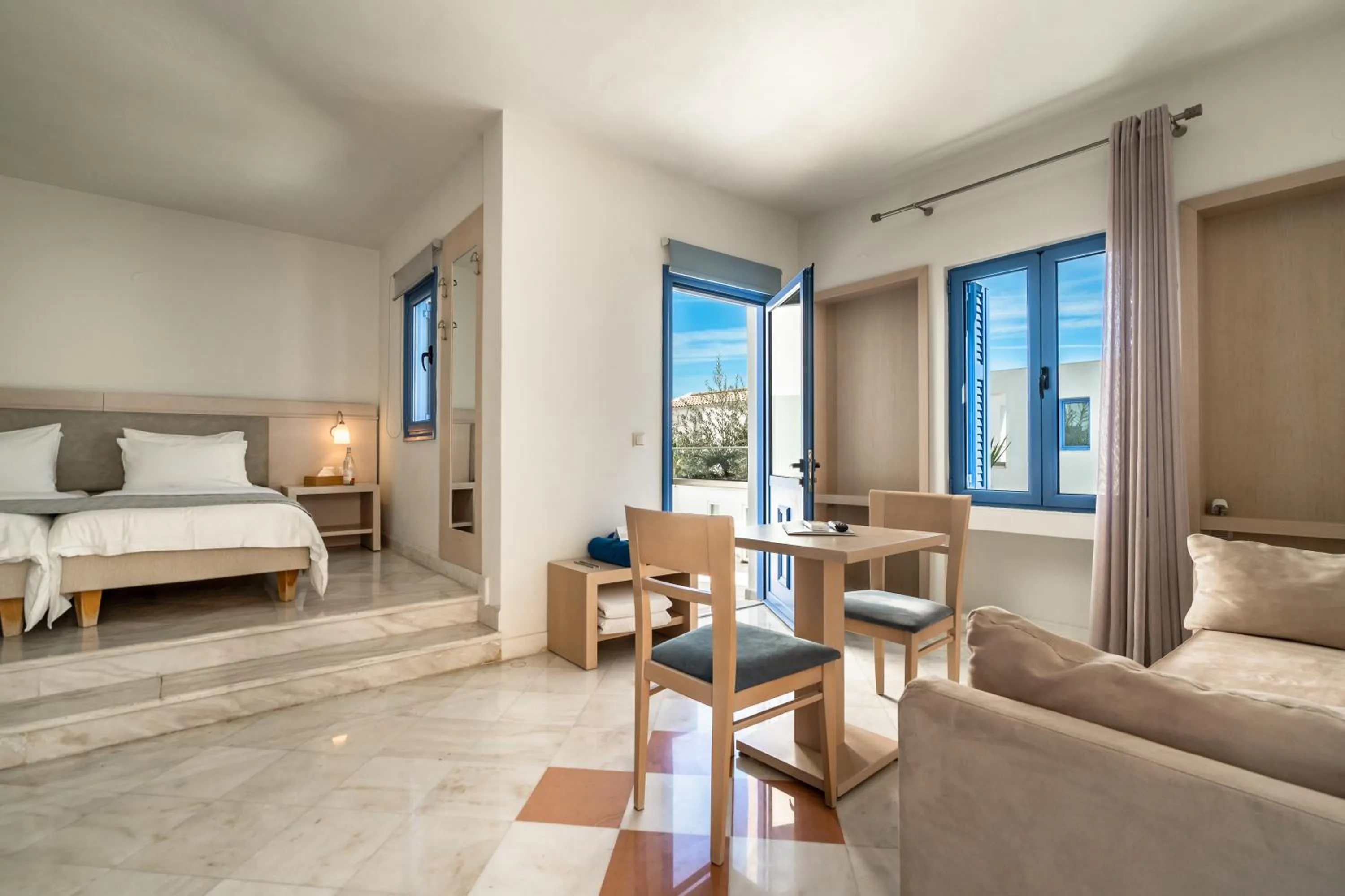 Bed in Porto Galini Seaside Resort & Spa