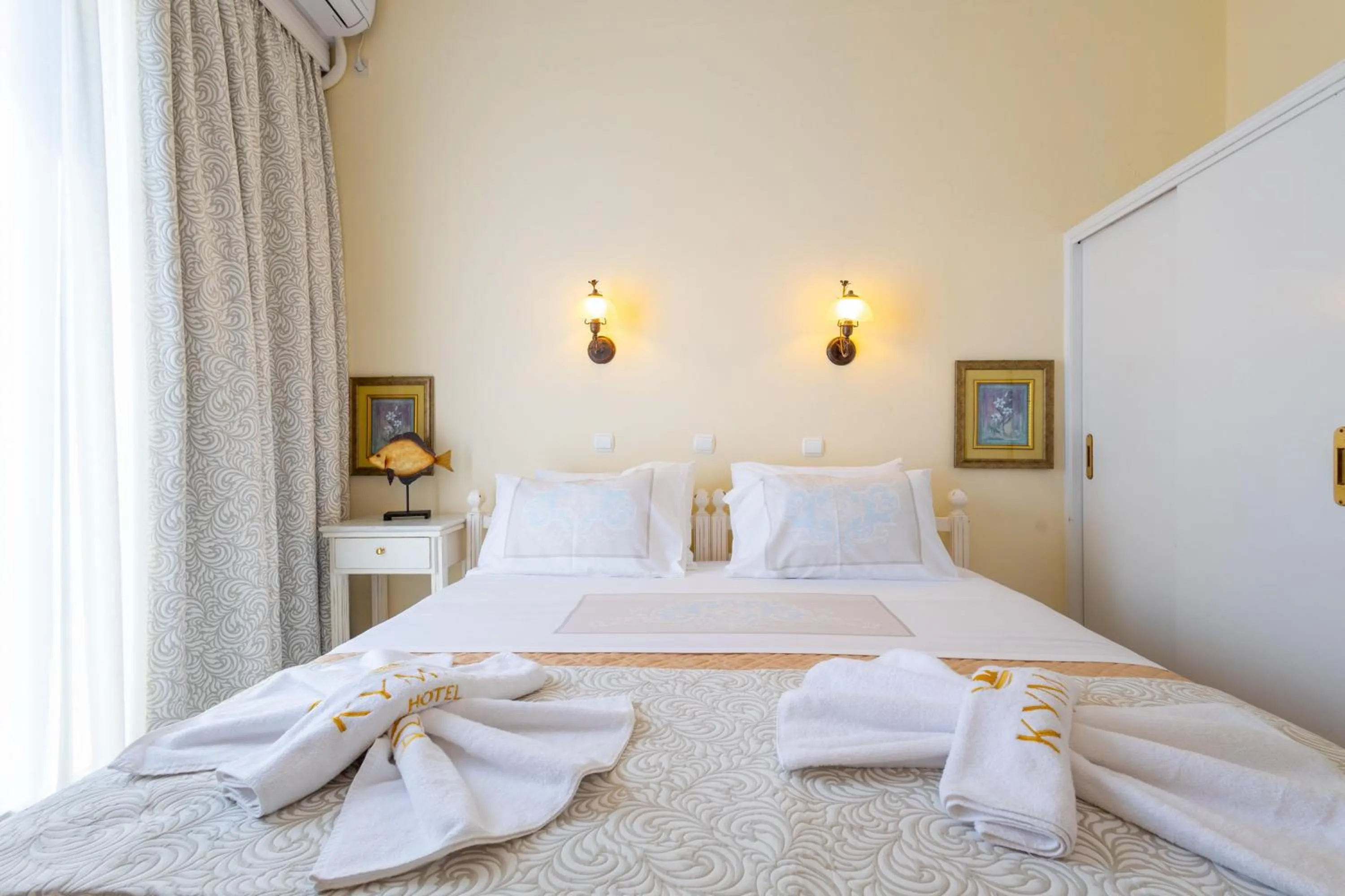 Bed in Kymata Hotel