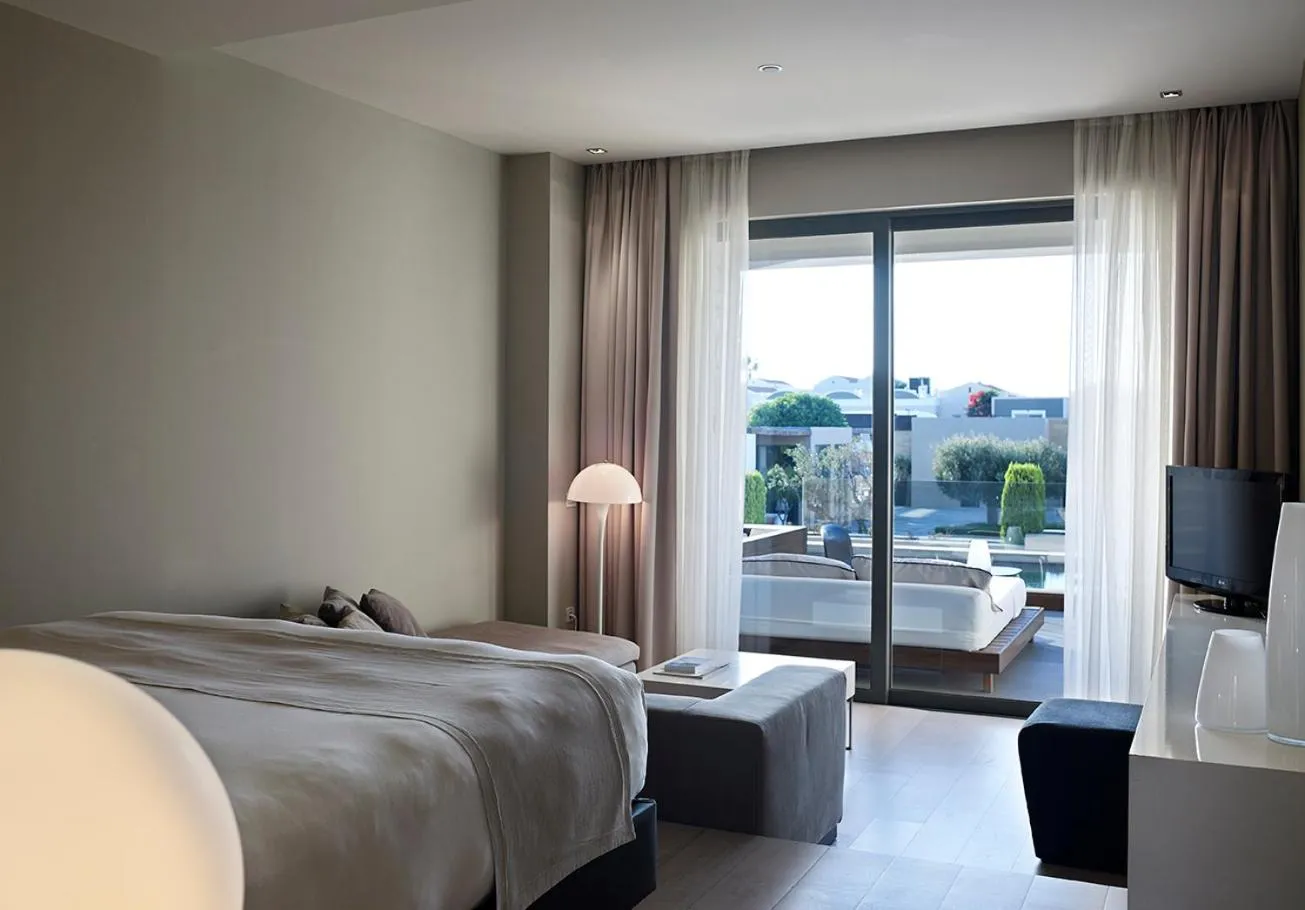 Photo of the whole room, Bed in Pelagos Suites Hotel & Spa