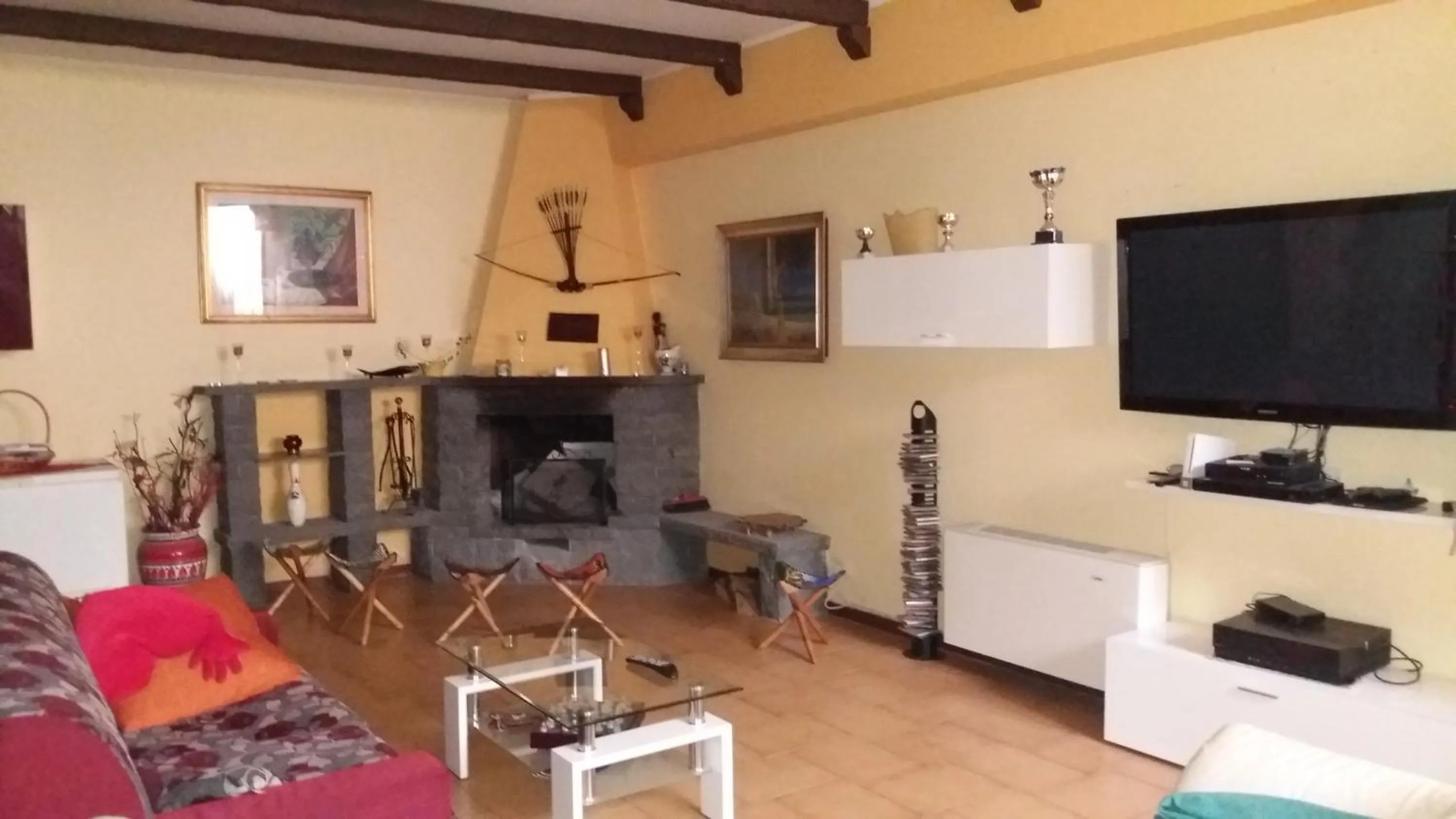 Communal lounge/ TV room in B&B Le Tre Rose Di Maria