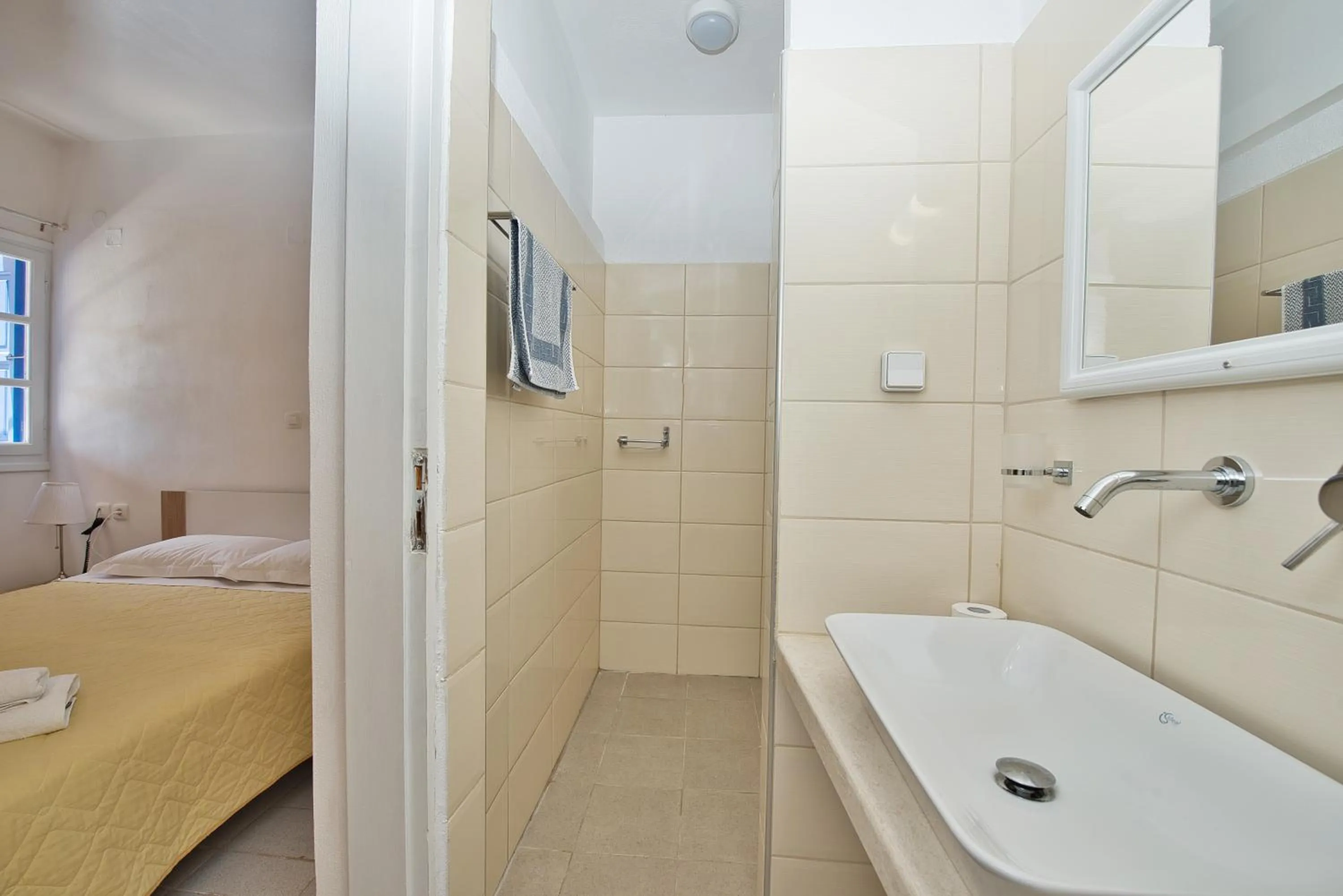 Bathroom, Bed in Caldera View Resort - Adults Only
