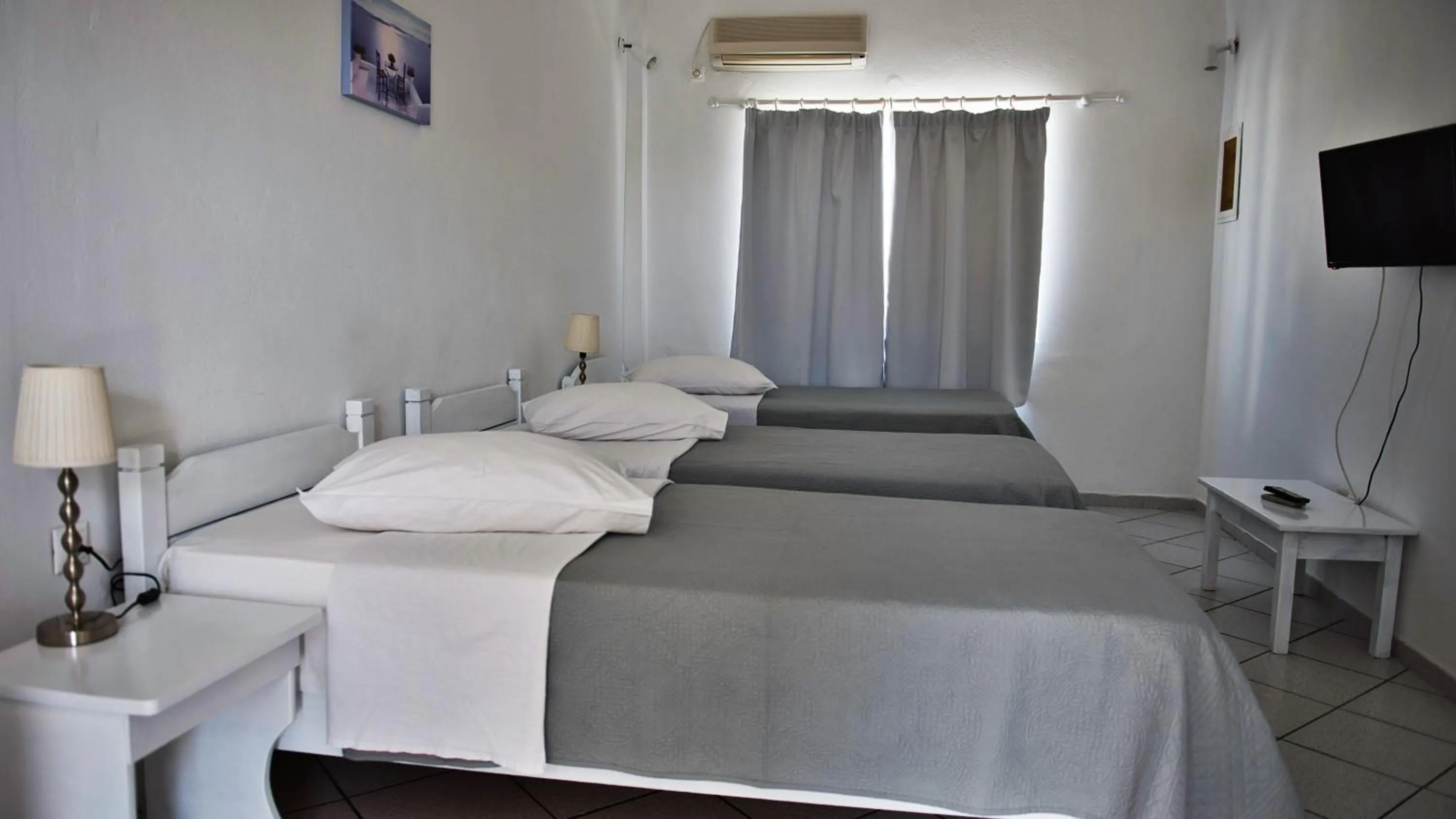 Bed in Caldera View Resort - Adults Only