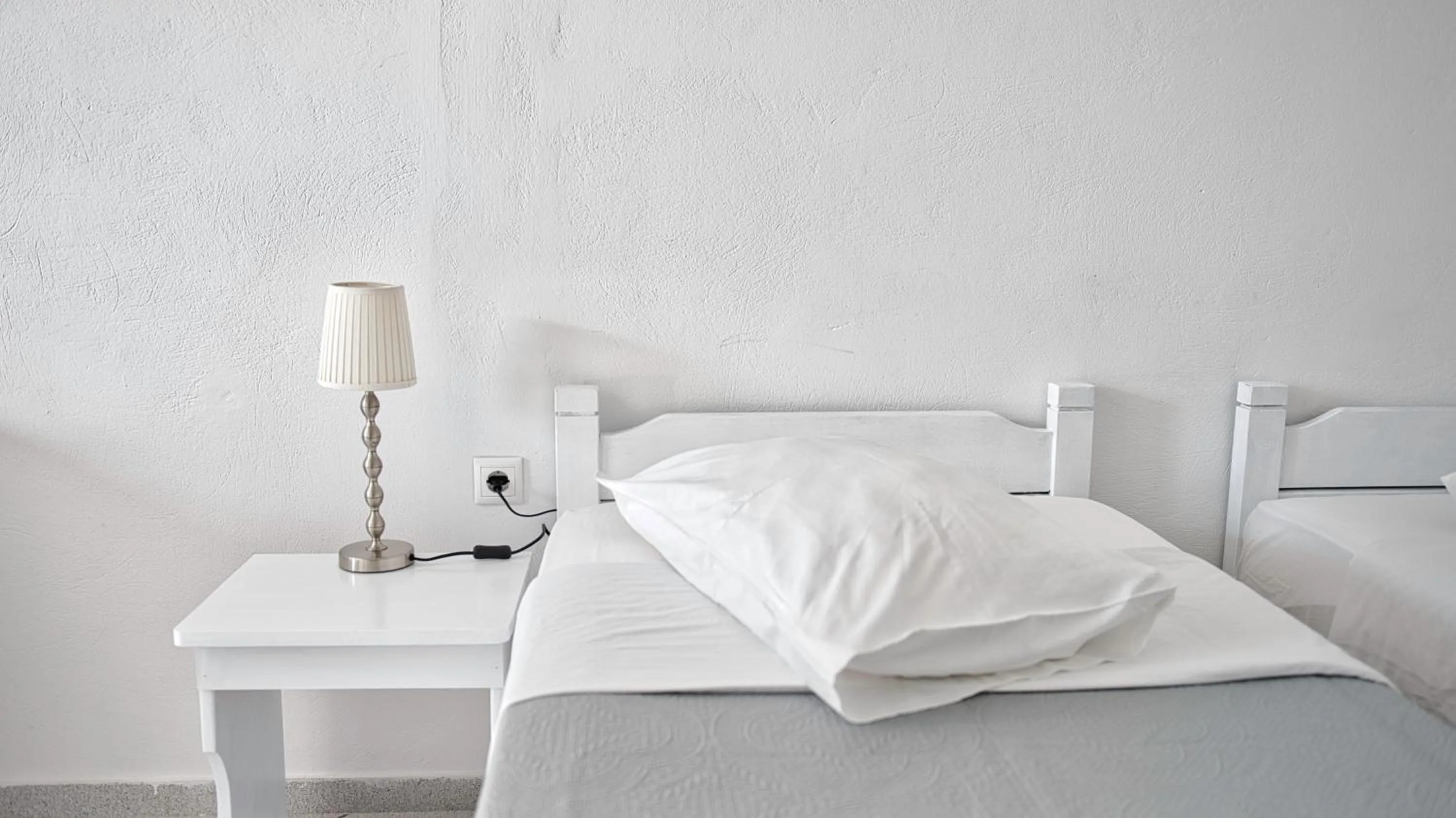 Bed in Caldera View Resort - Adults Only