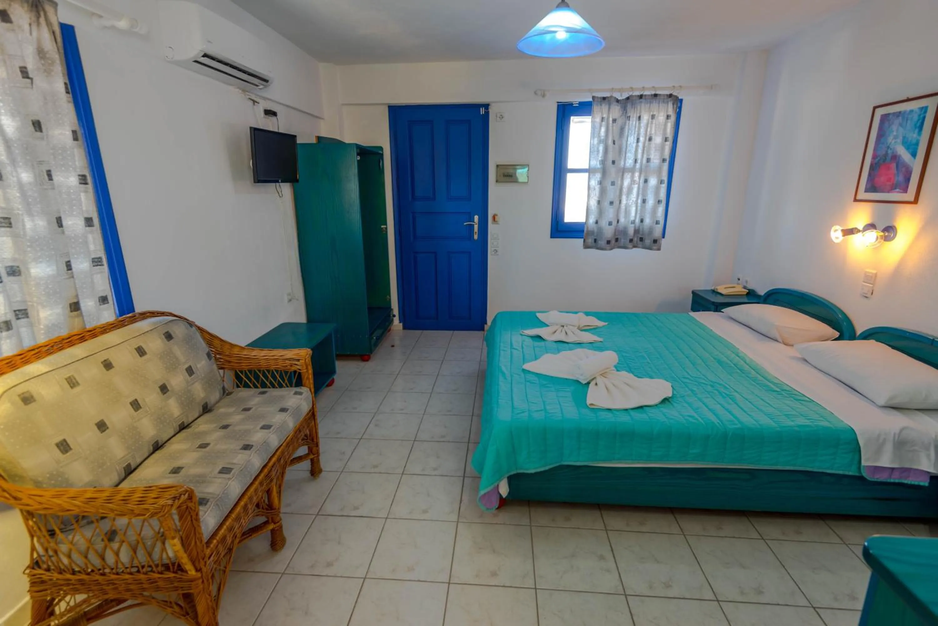 Living room, Bed in Caldera View Resort - Adults Only