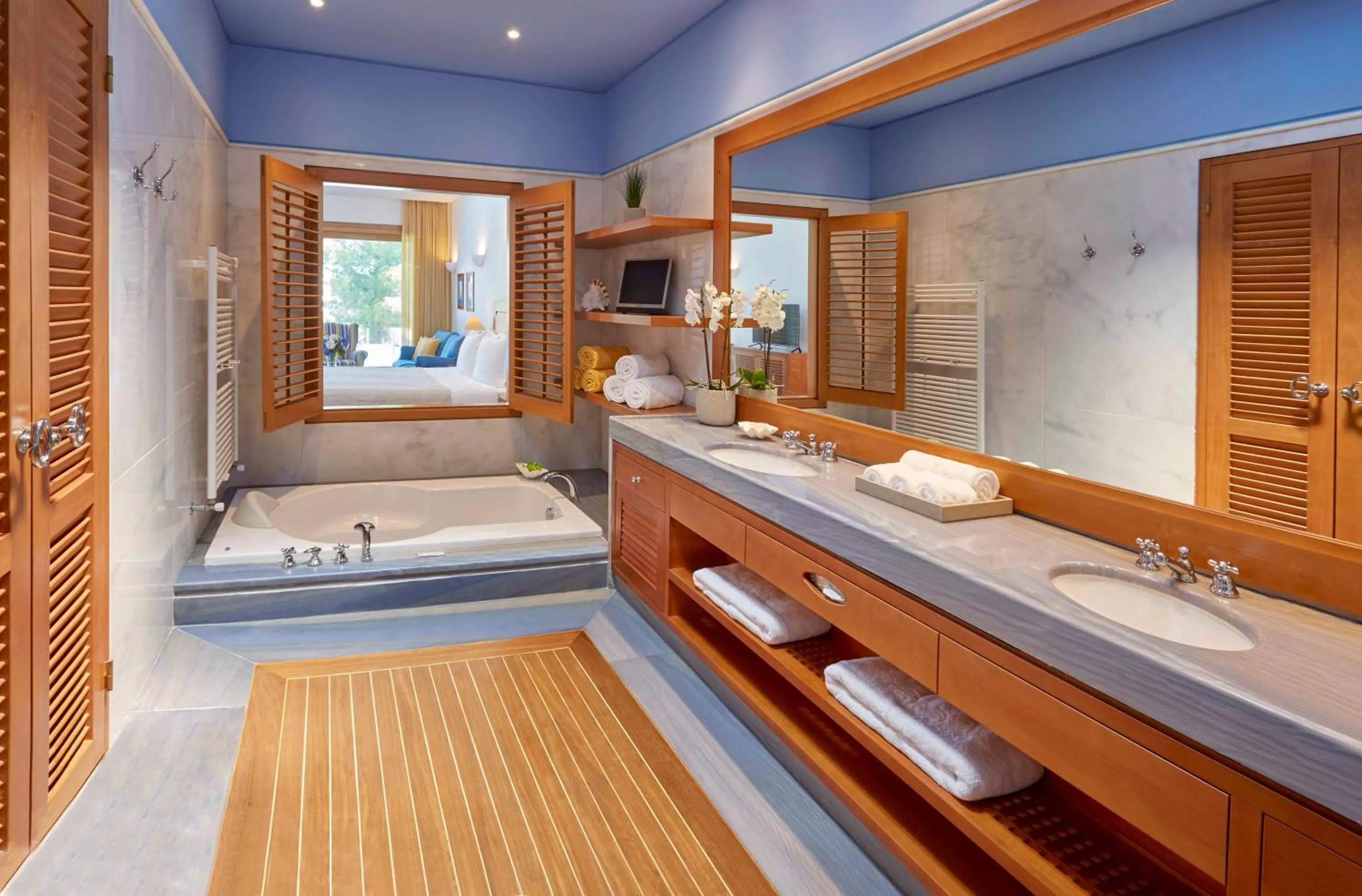 Bathroom, Bed in Elounda Bay Palace, a Member of the Leading Hotels of the World