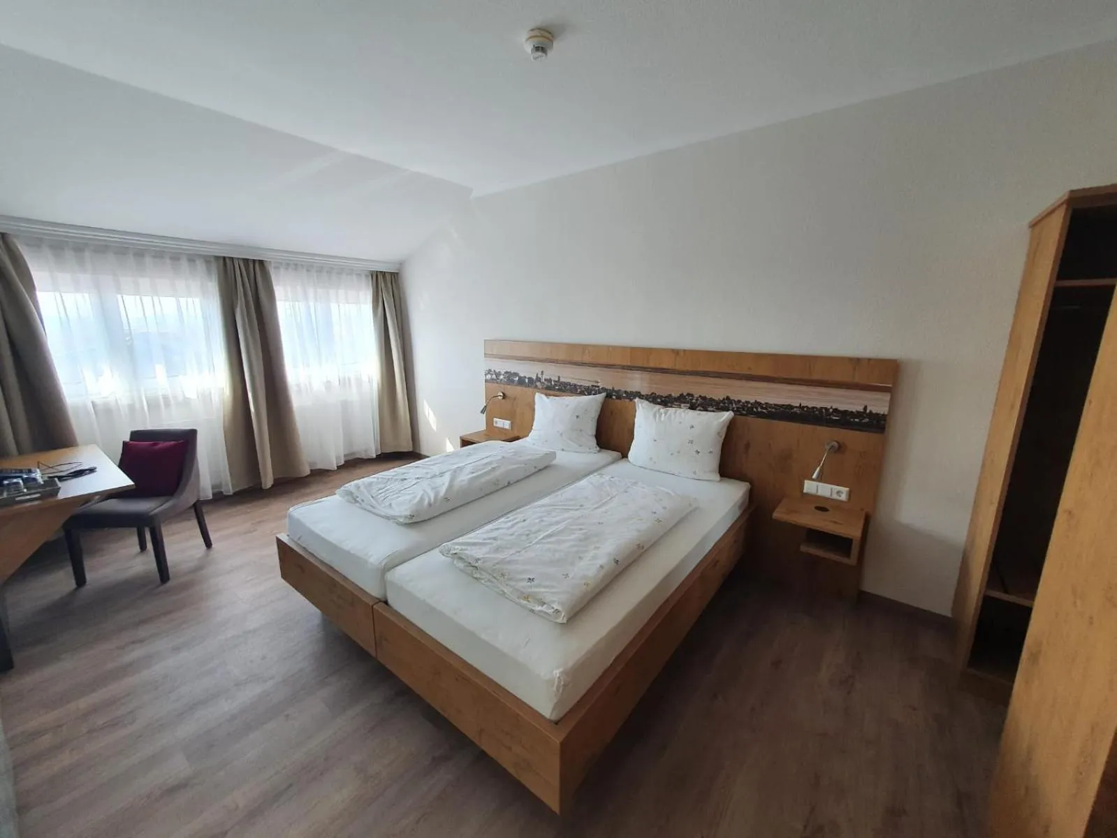 Photo of the whole room, Bed in Hotel & Restaurant "Am Obstgarten"