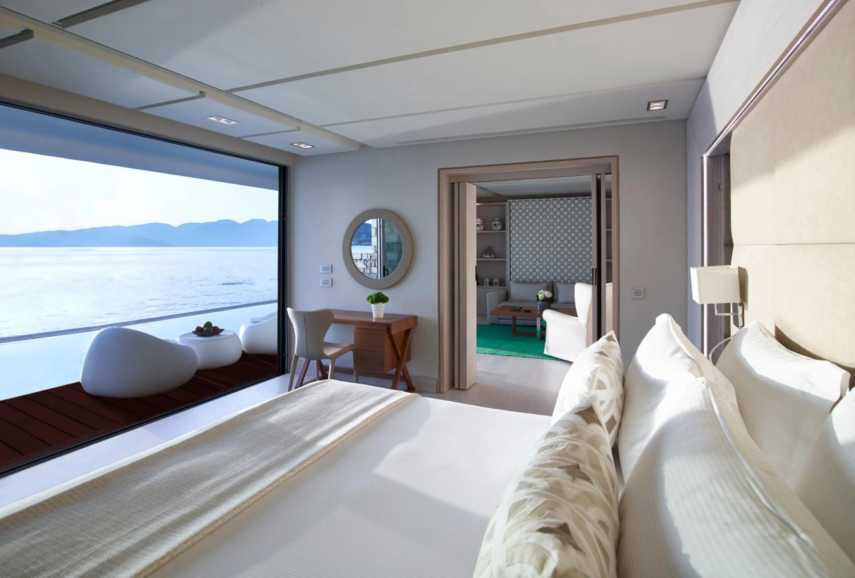 Living room, Bed in Elounda Beach Hotel & Villas, a Member of the Leading Hotels of the World