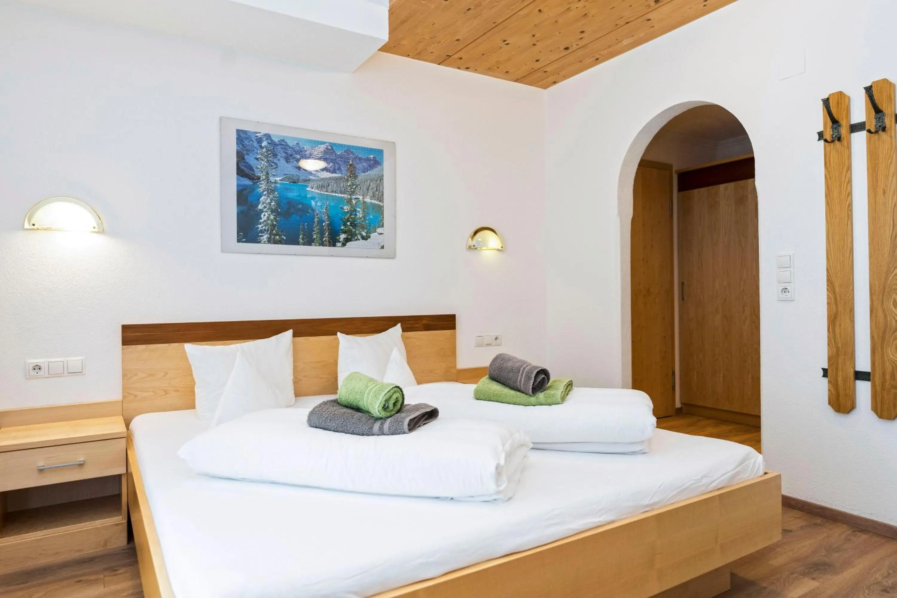 Photo of the whole room, Bed in Hotel Garni Siegele - inklusive Silvretta-Card PREMIUM