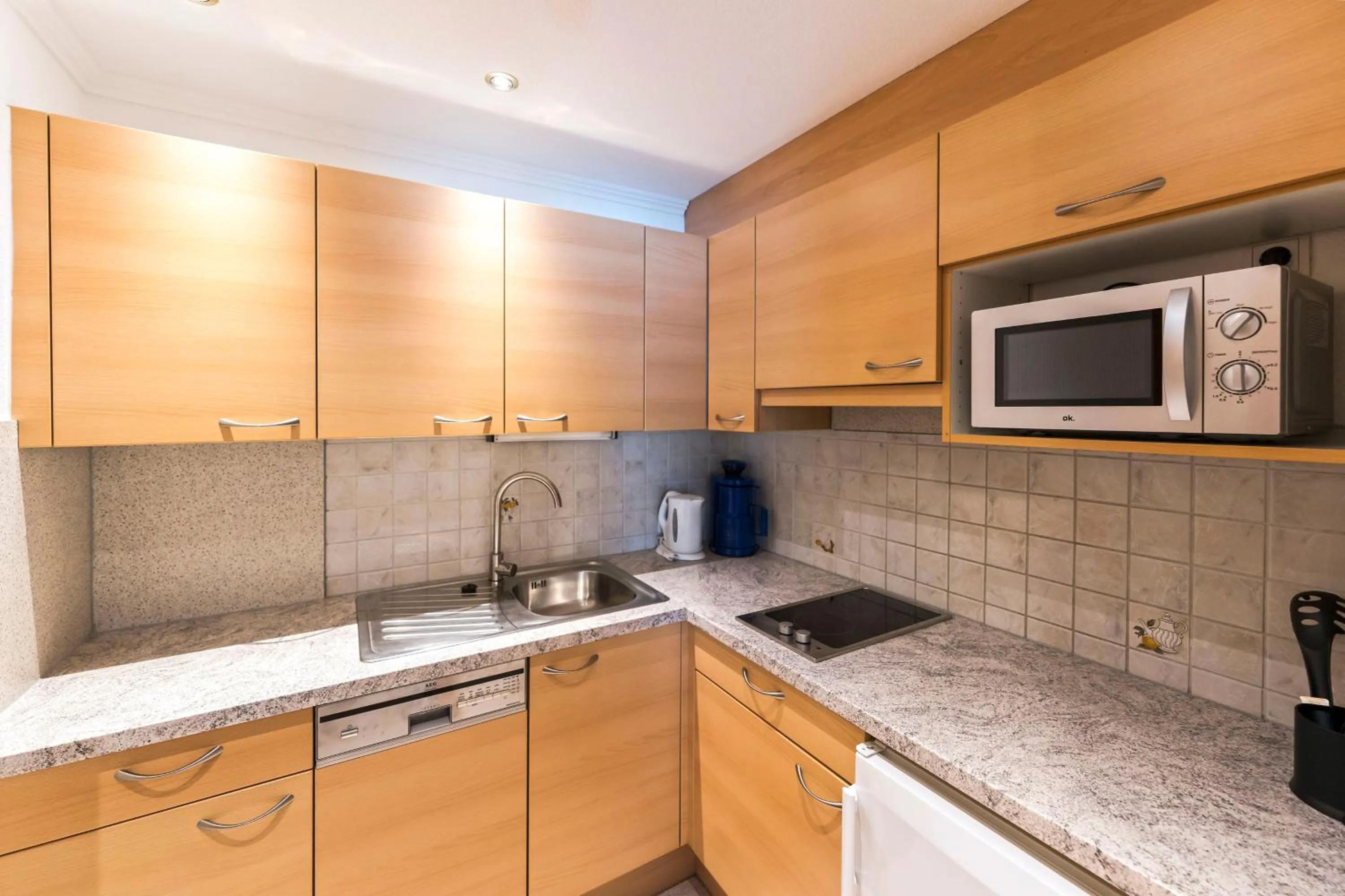 Kitchen or kitchenette in Hotel Garni Siegele - inklusive Silvretta-Card PREMIUM