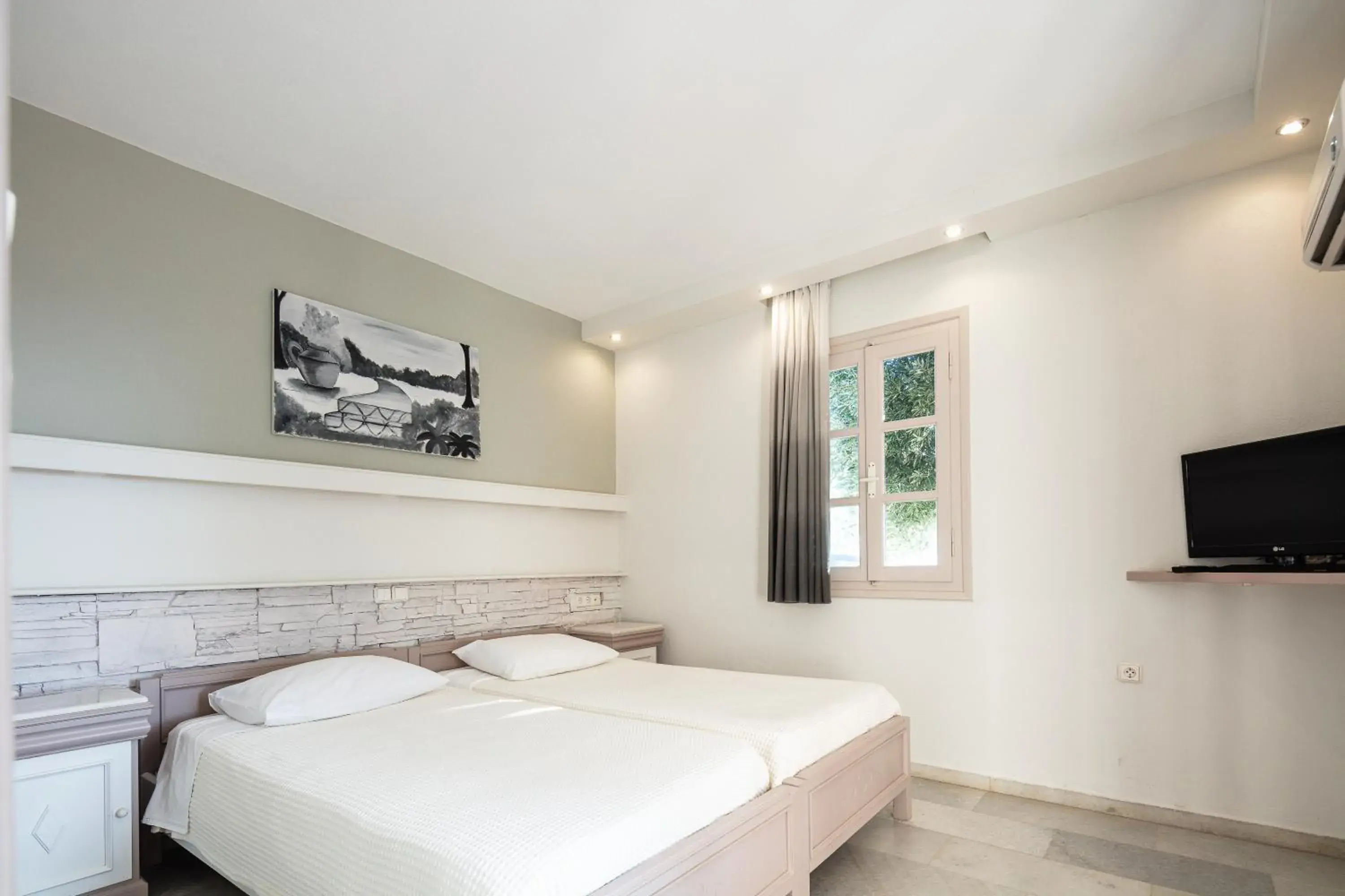 Family Room with Sea View and Terrace in Kavuras Village Hotel & Suites Family Room with Sea View and Terrace in Kavuras Village Hotel & Suites