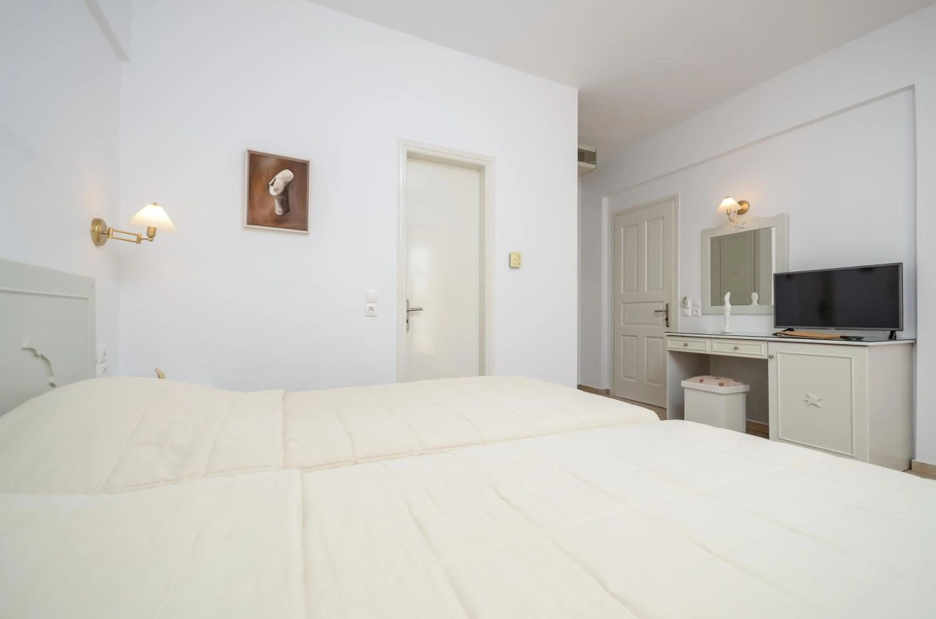 Photo of the whole room, Bed in Astir Of Naxos