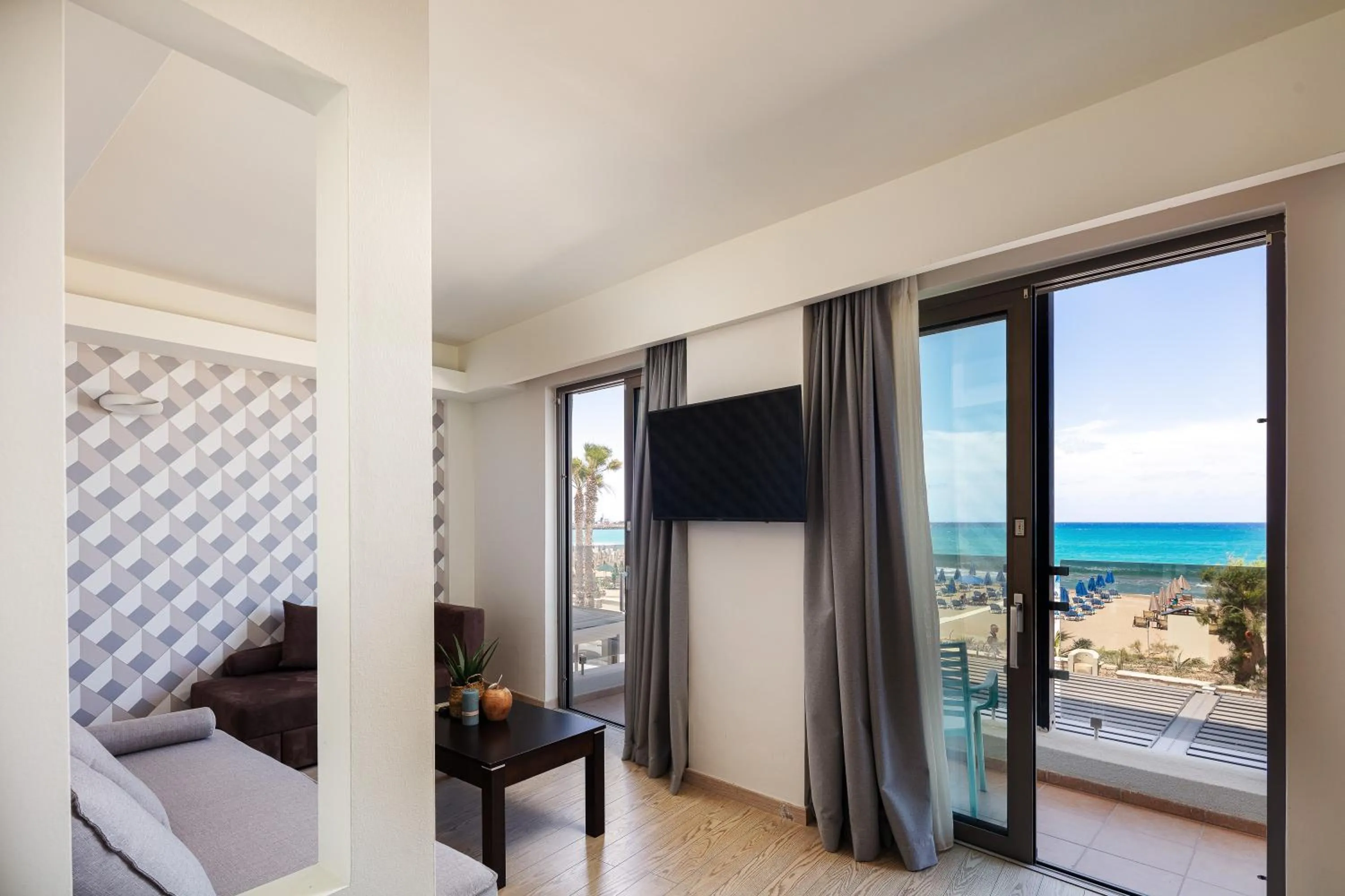 Seating area, Bed in Steris Elegant Beach Hotel