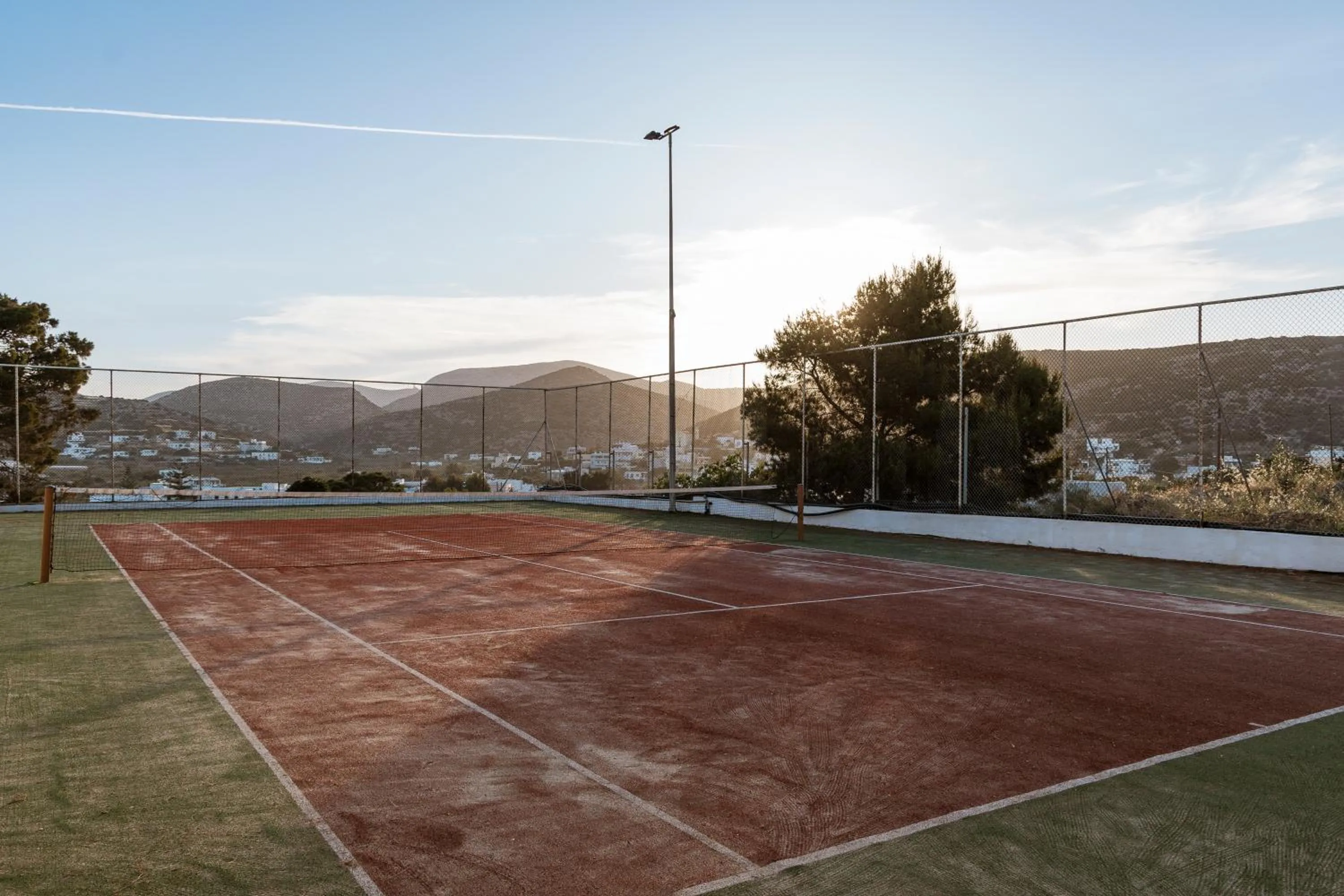 Tennis court in Dolphin Bay Seaside Resort & Suites