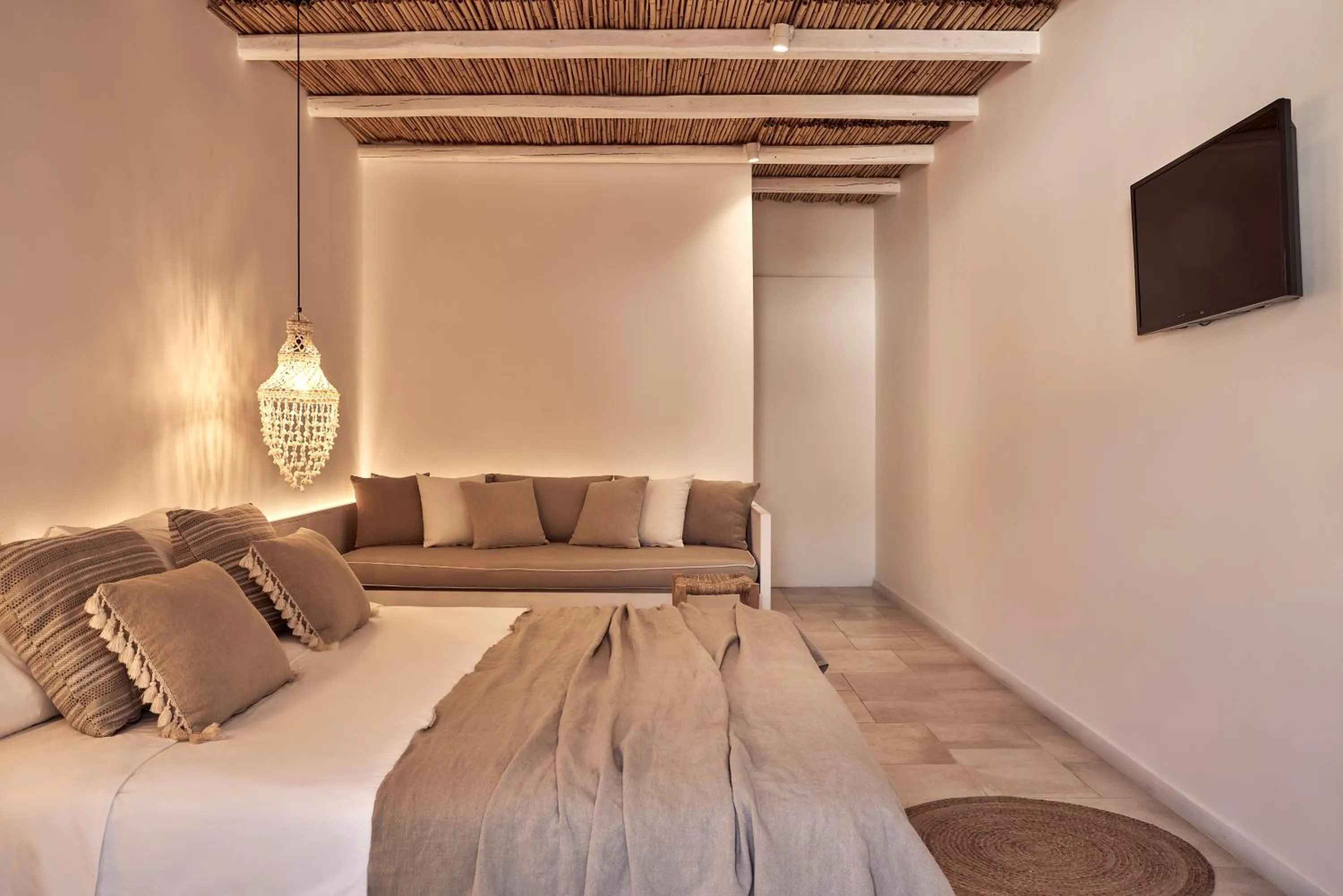 Seating area, Bed in Dionysos Seaside Resort Ios