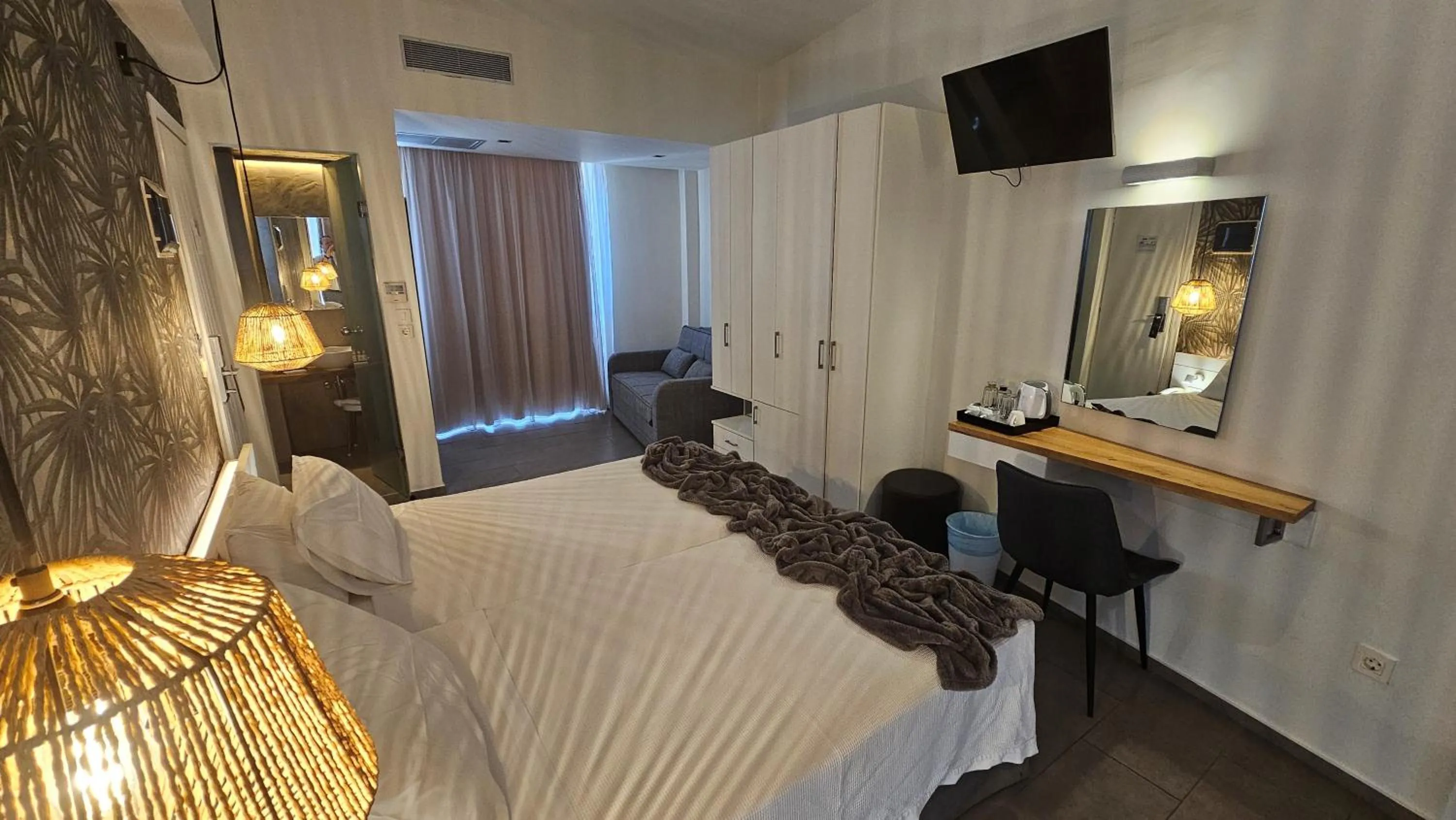 Bedroom in Atlantis Boutique City Hotel