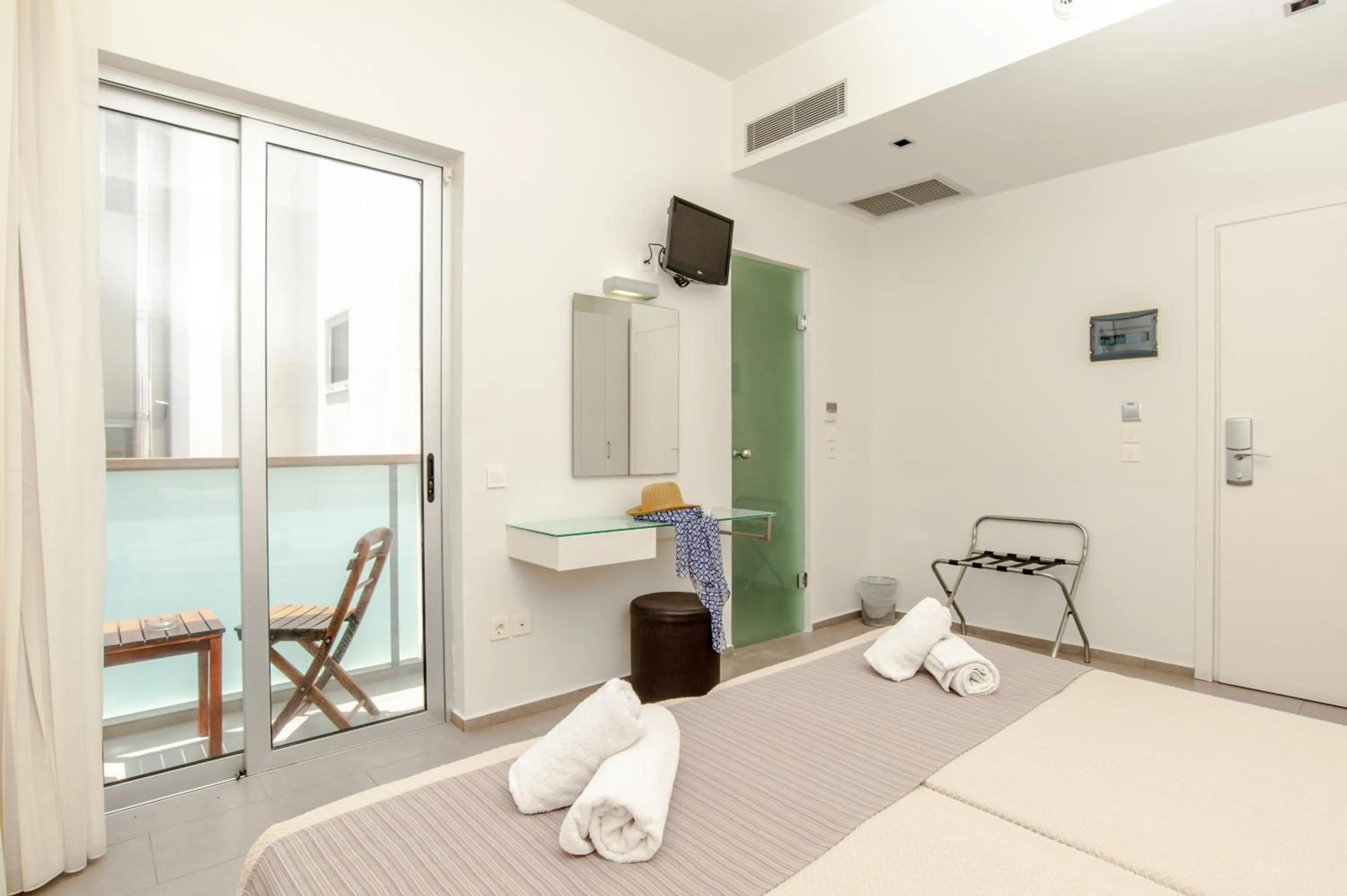 Bed in Atlantis Boutique City Hotel