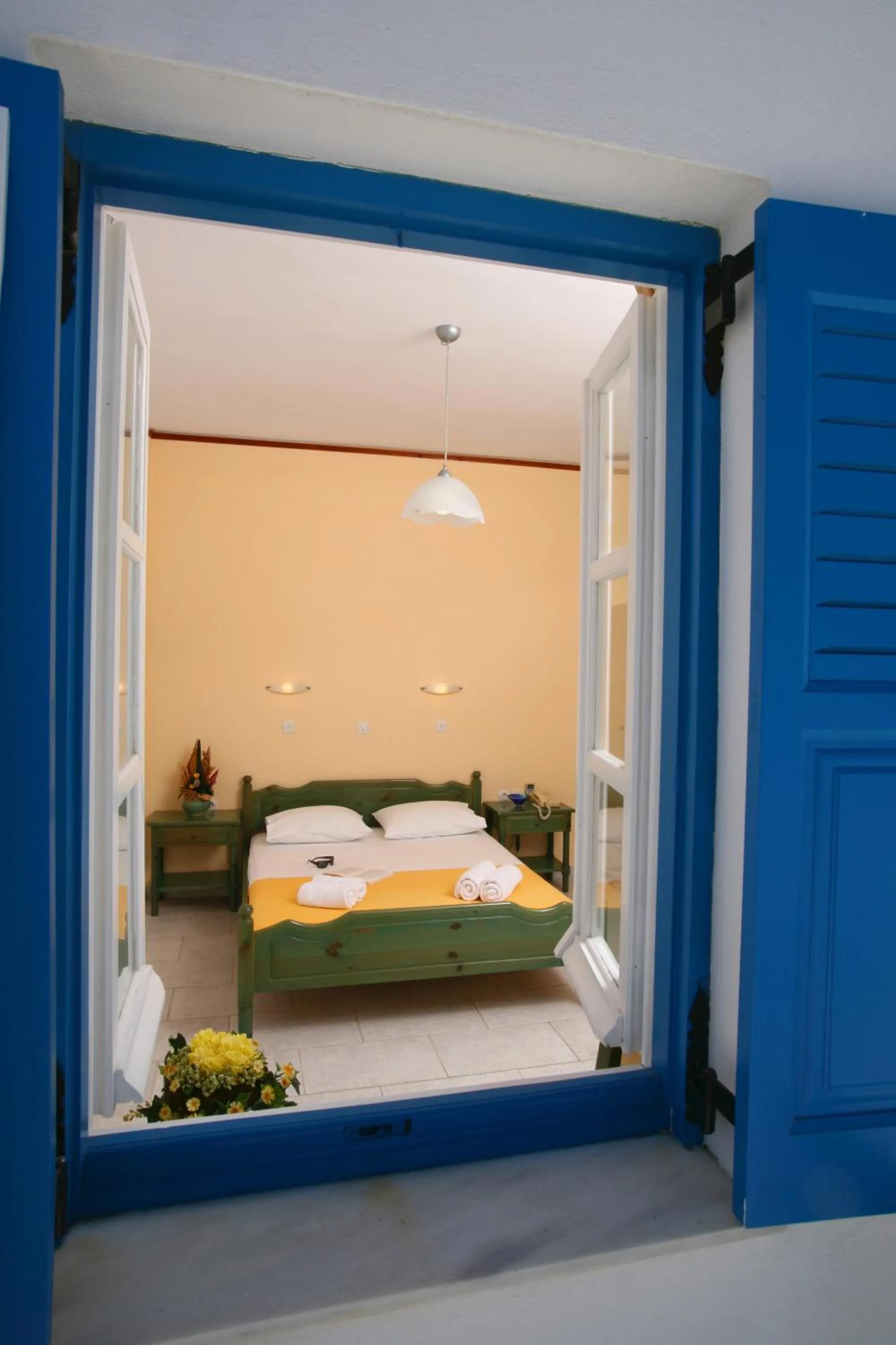 Bed in Poseidon Hotel