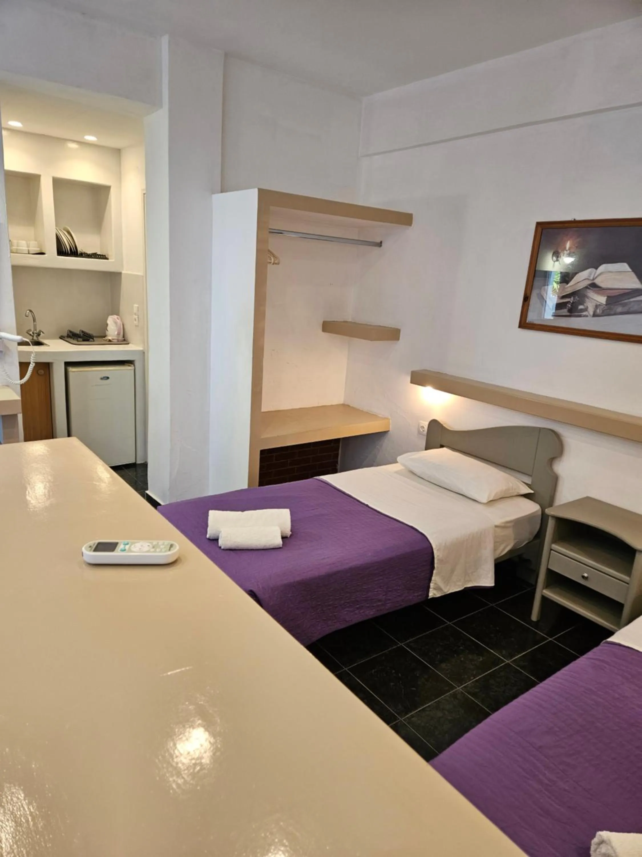 Bed in Skala Sunset Hotel and spa