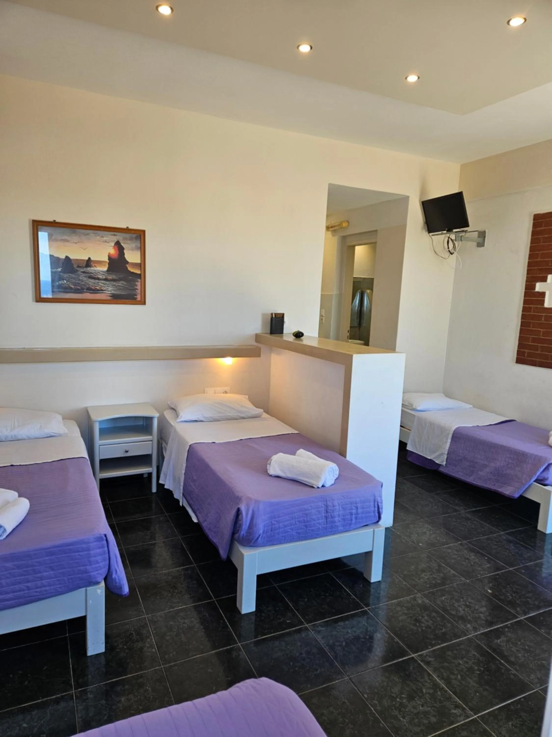 Bed in Skala Sunset Hotel and spa