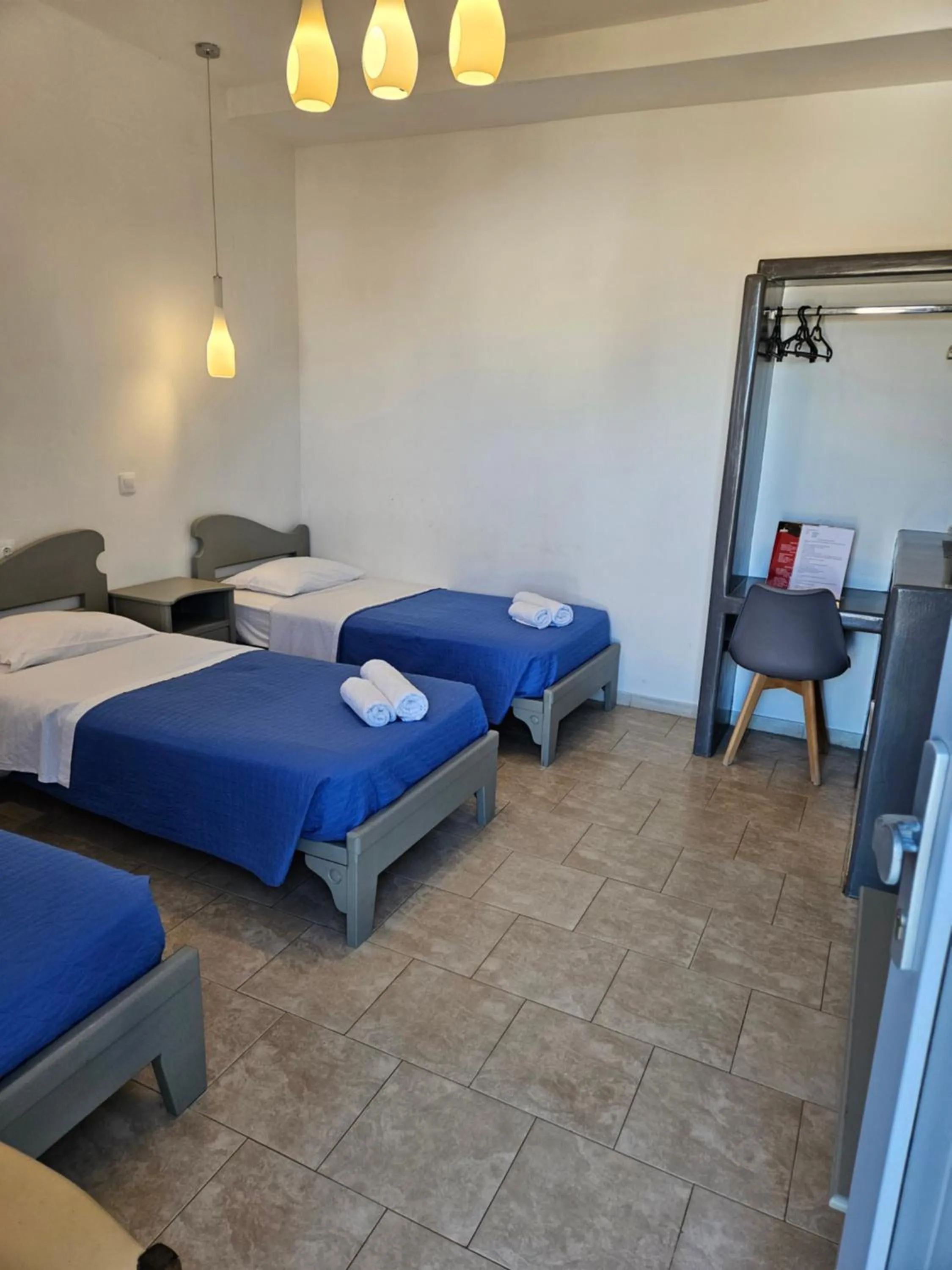 Bed in Skala Sunset Hotel and spa