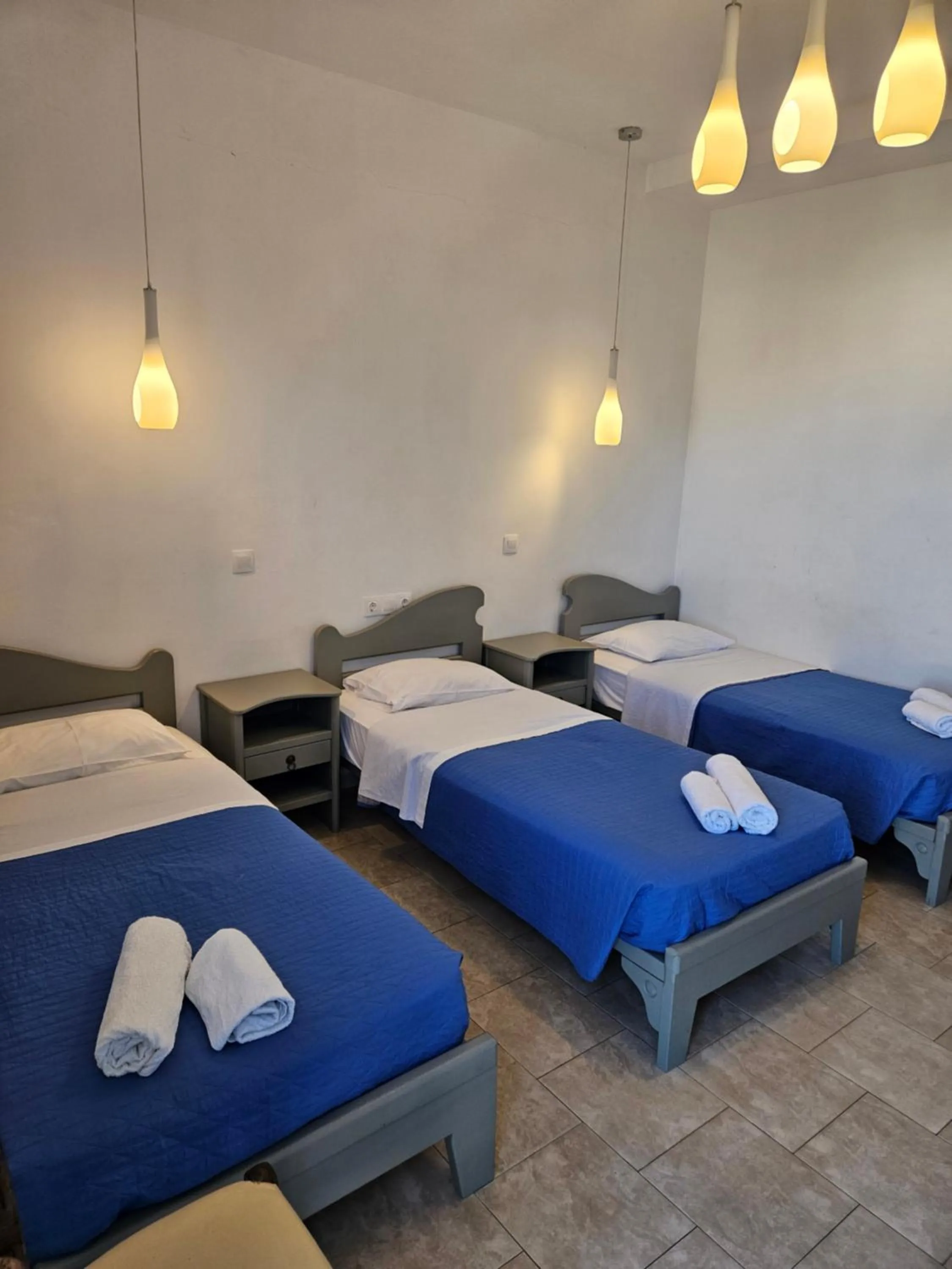 Bed in Skala Sunset Hotel and spa