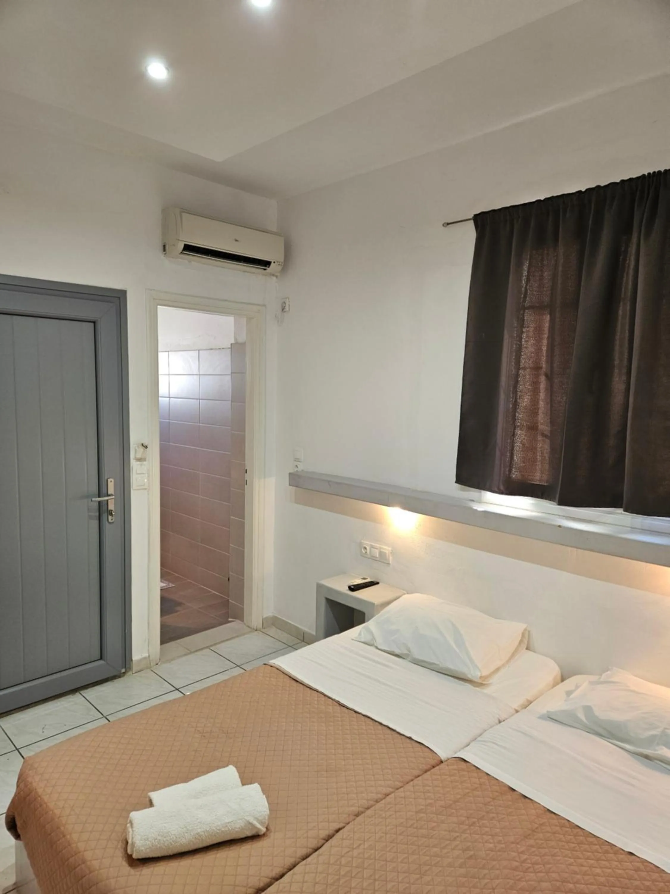 Bed in Skala Sunset Hotel and spa