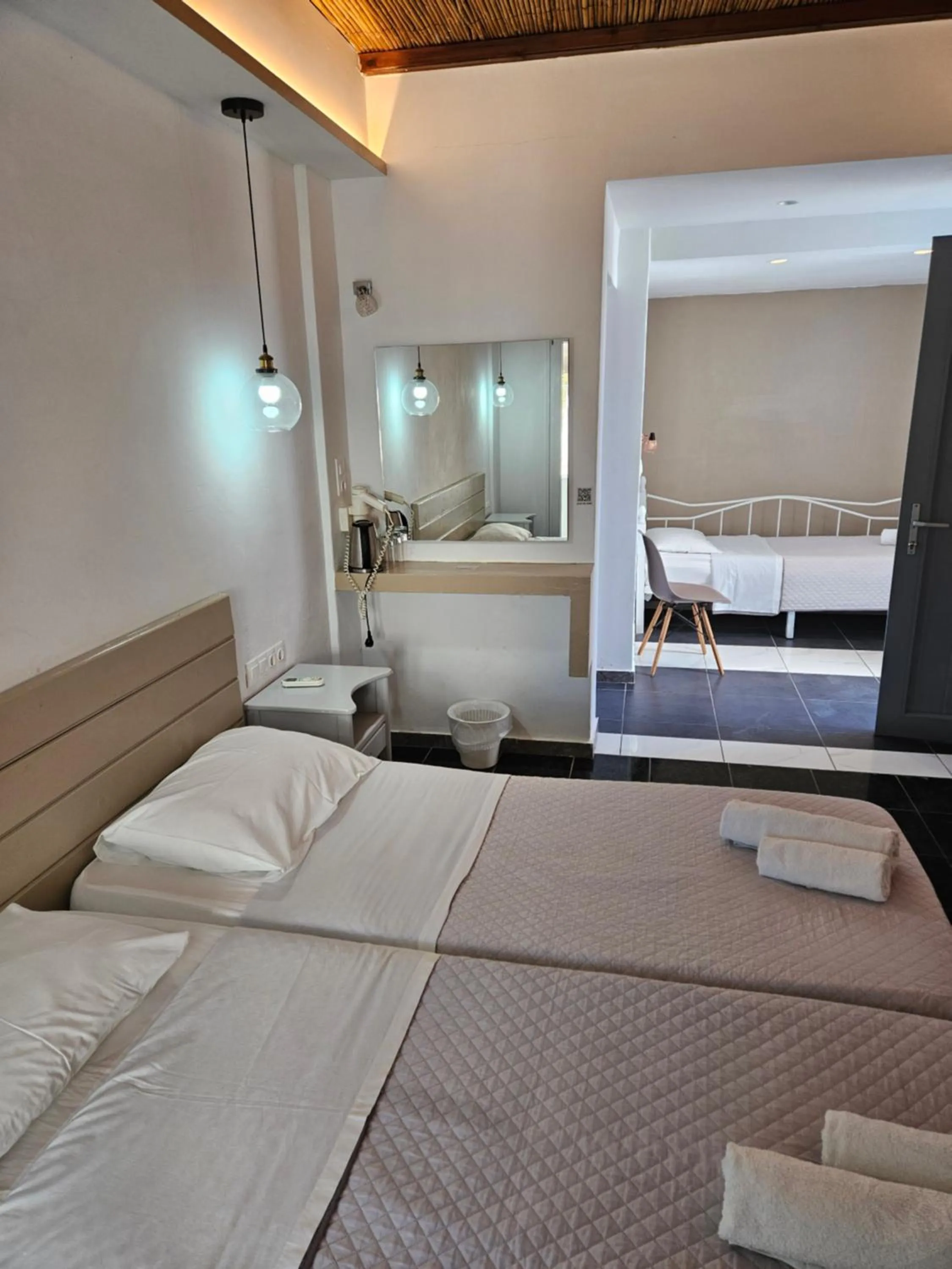 Bed in Skala Sunset Hotel and spa