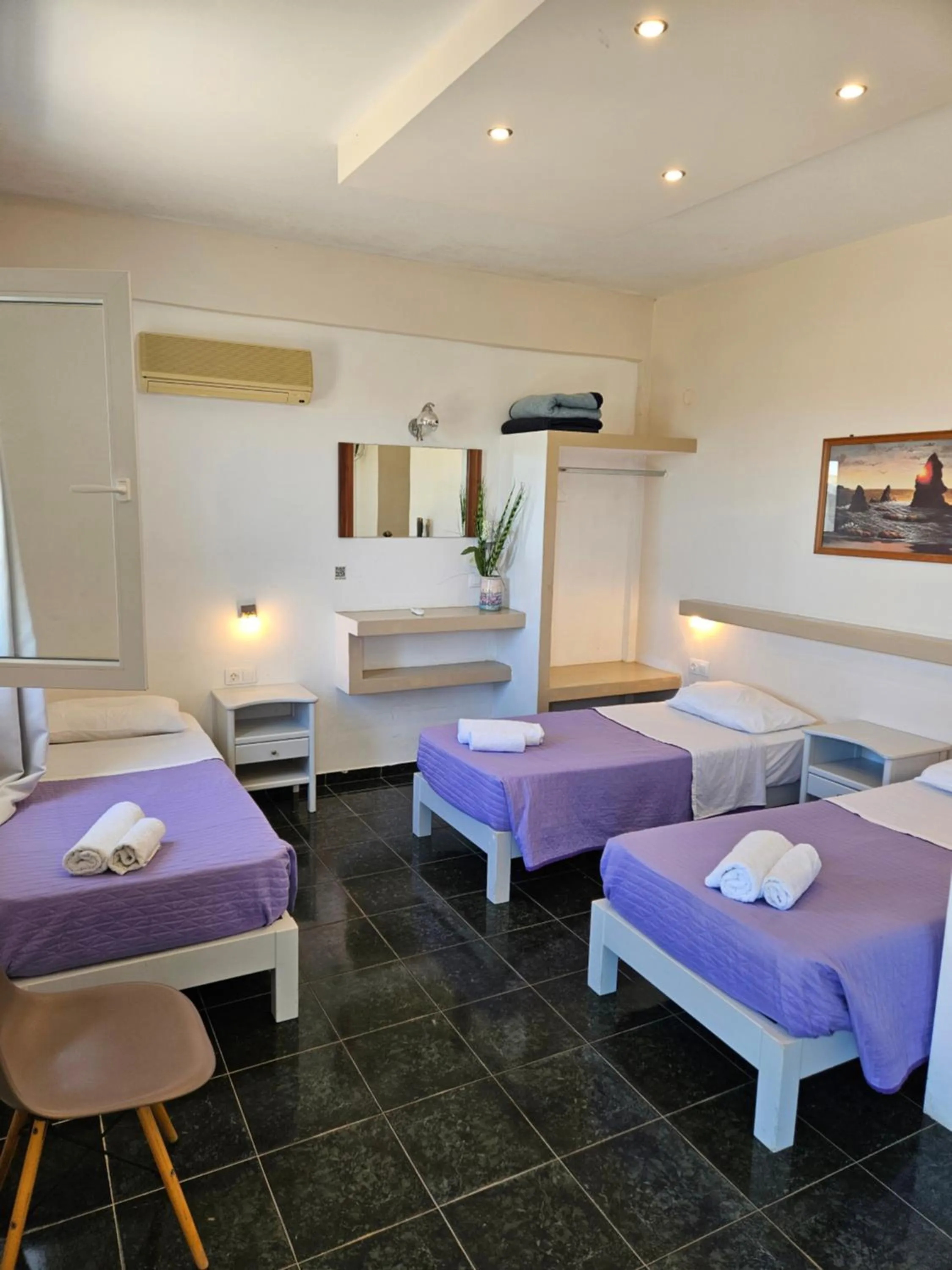 Bed in Skala Sunset Hotel and spa