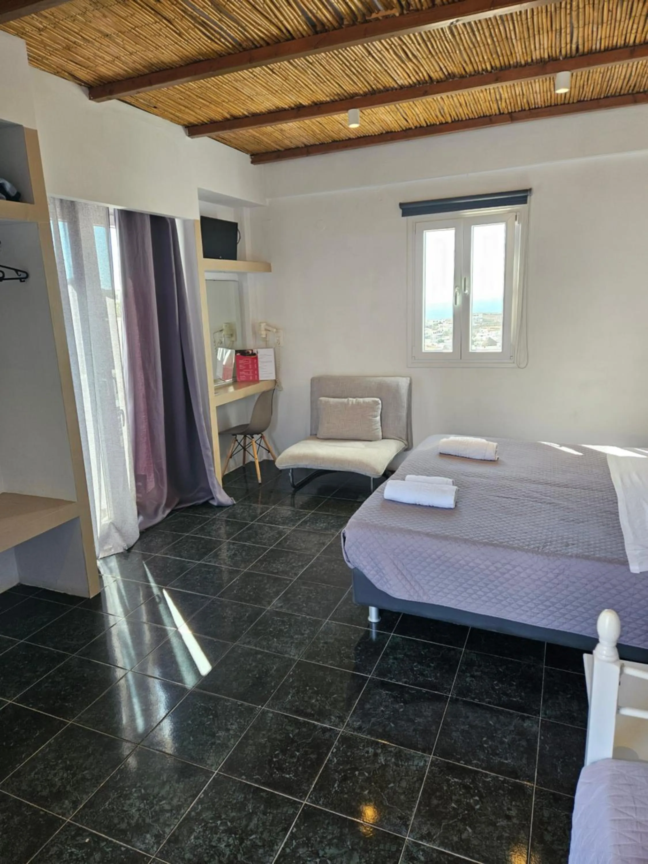 Bed in Skala Sunset Hotel and spa