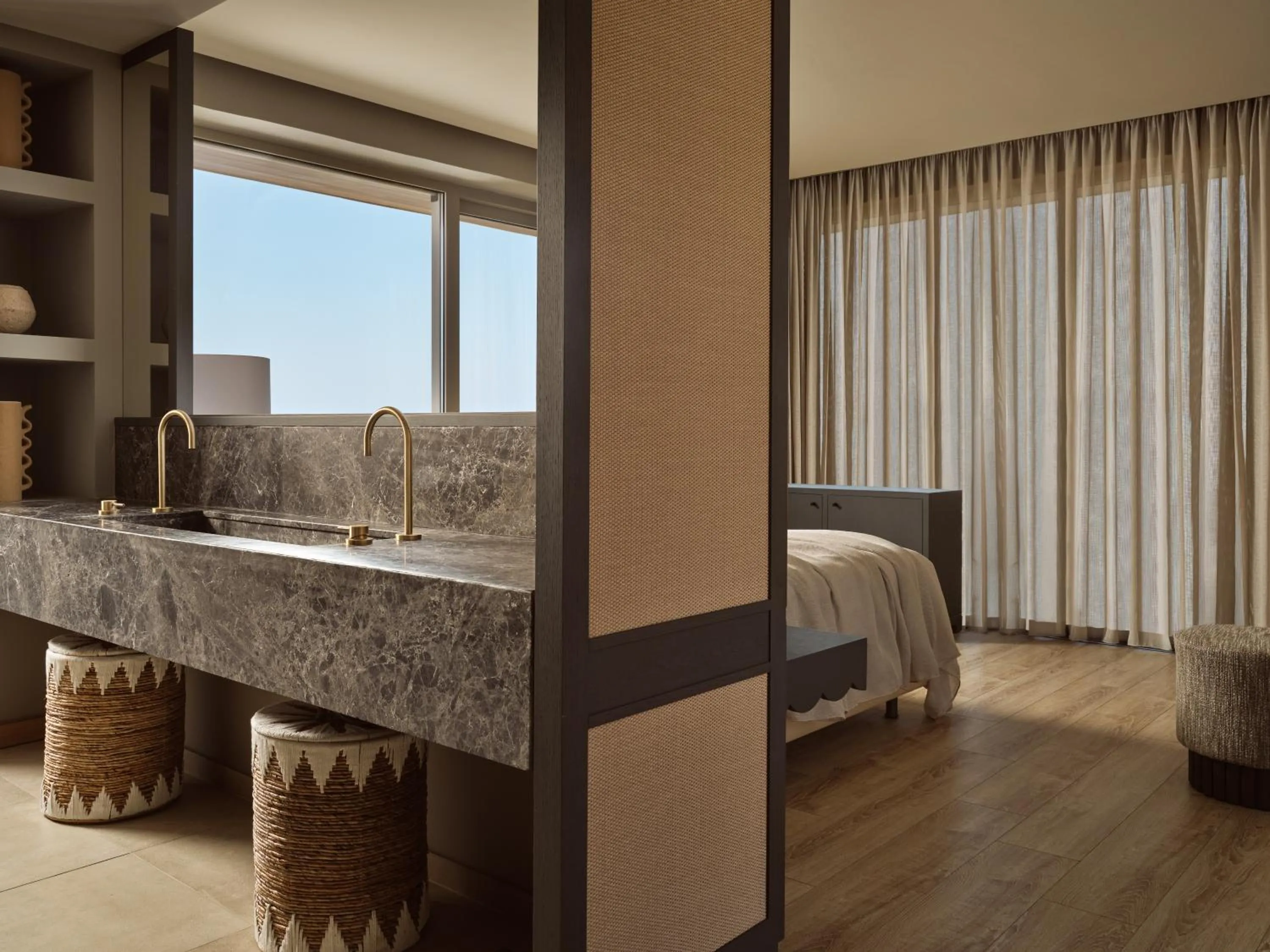 Bed in The Royal Blue a Luxury Beach Resort