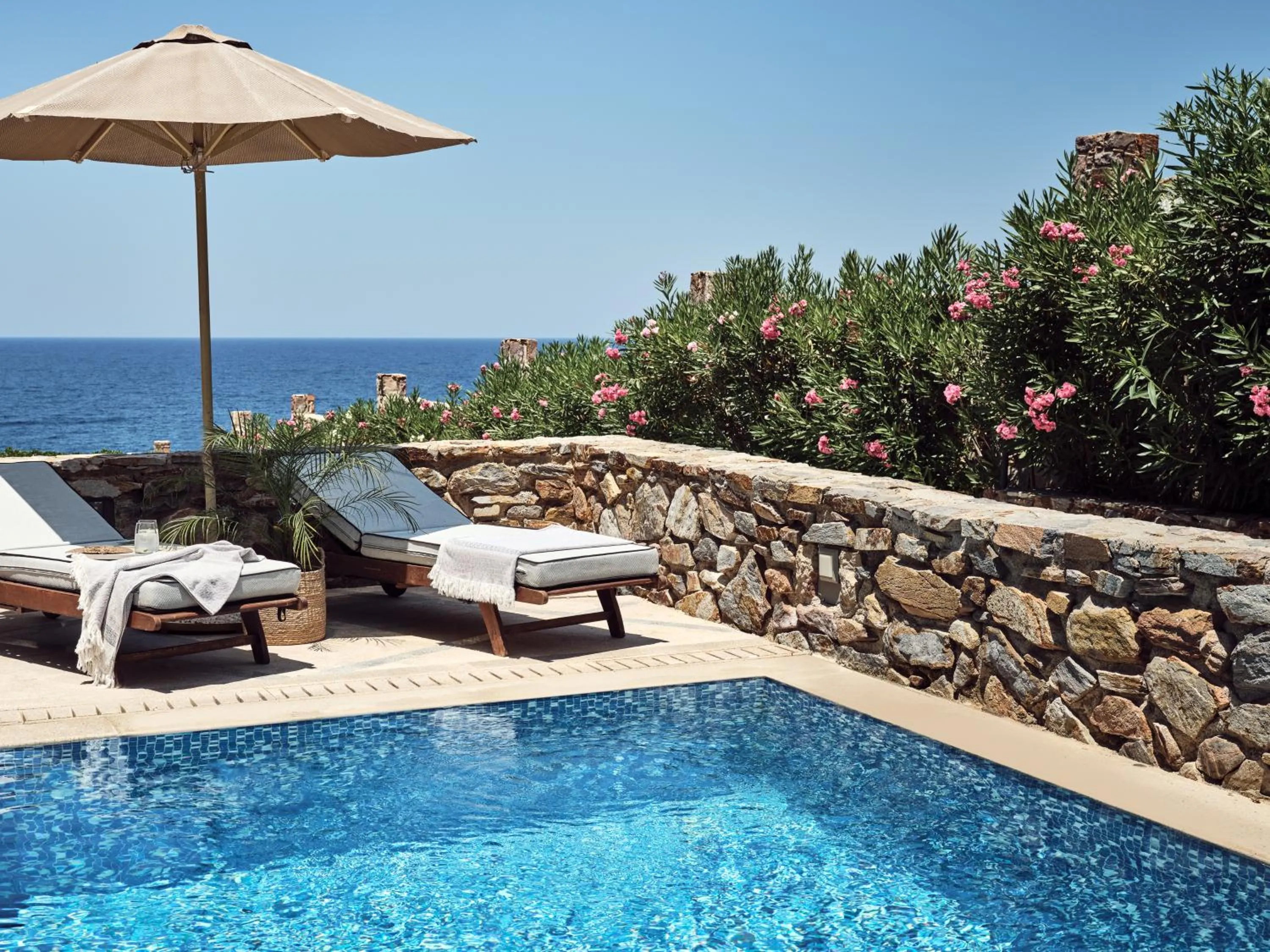 Swimming pool in The Royal Blue a Luxury Beach Resort