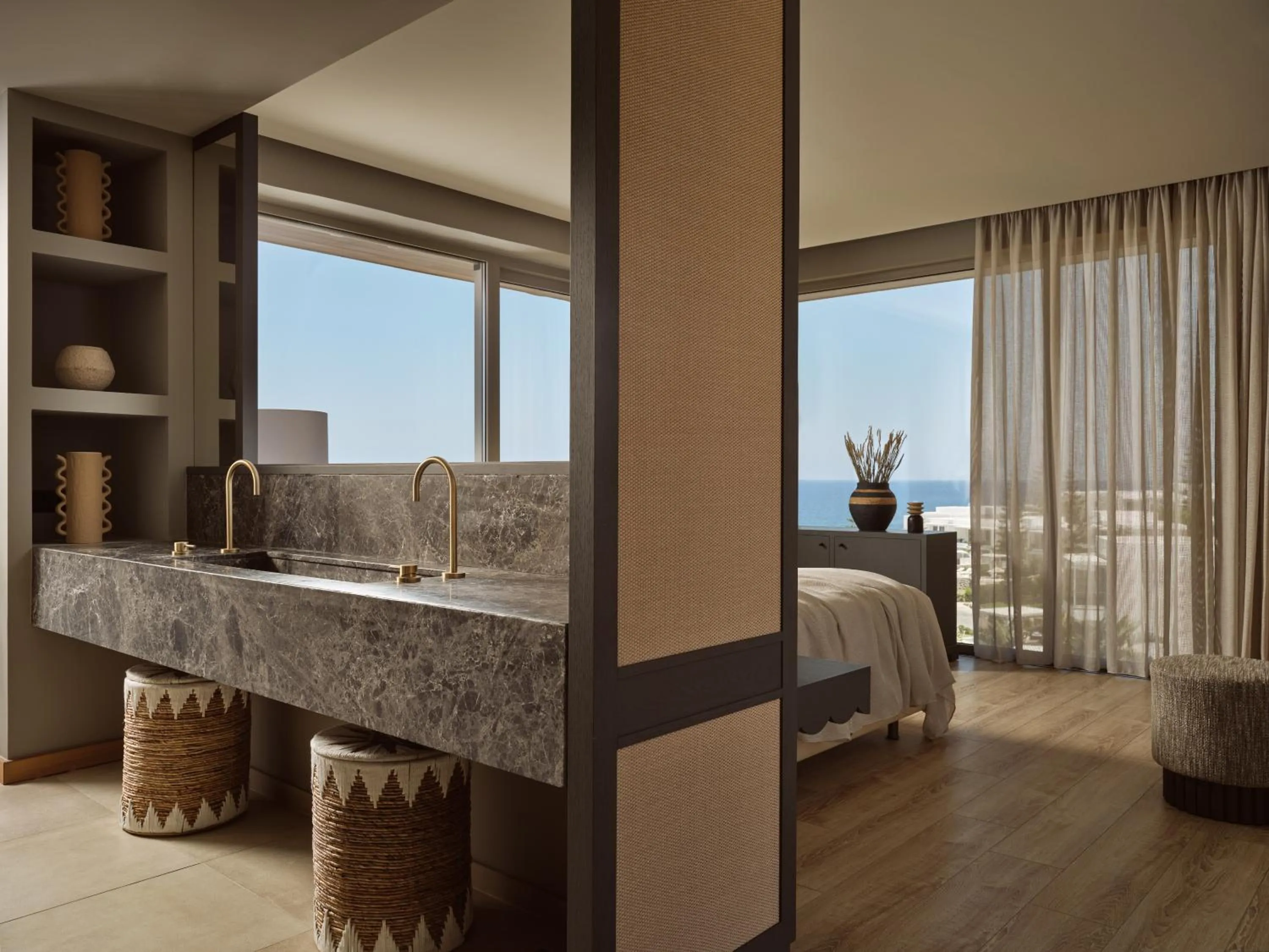 Bed in The Royal Blue a Luxury Beach Resort