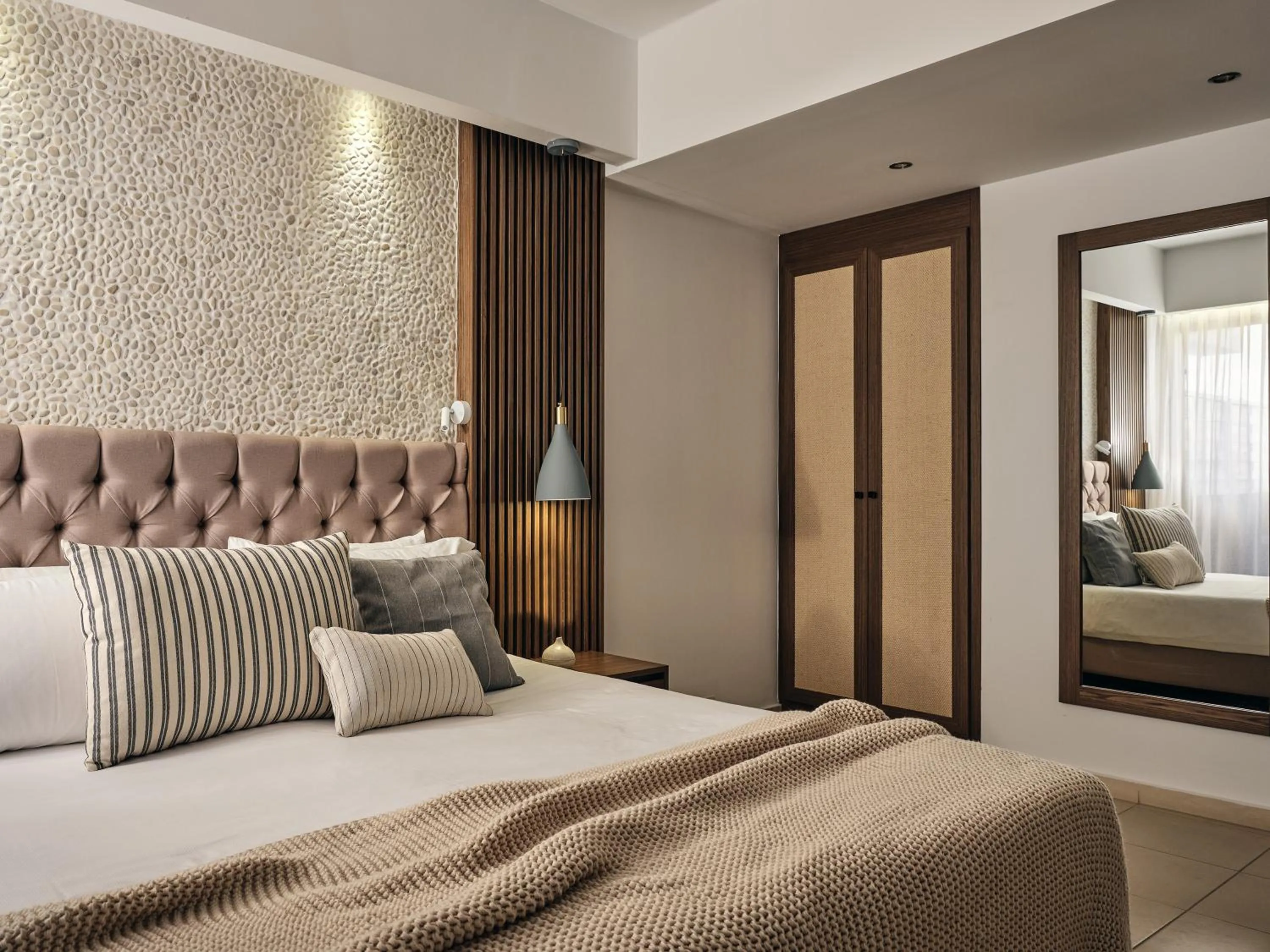 Bed in The Royal Blue a Luxury Beach Resort