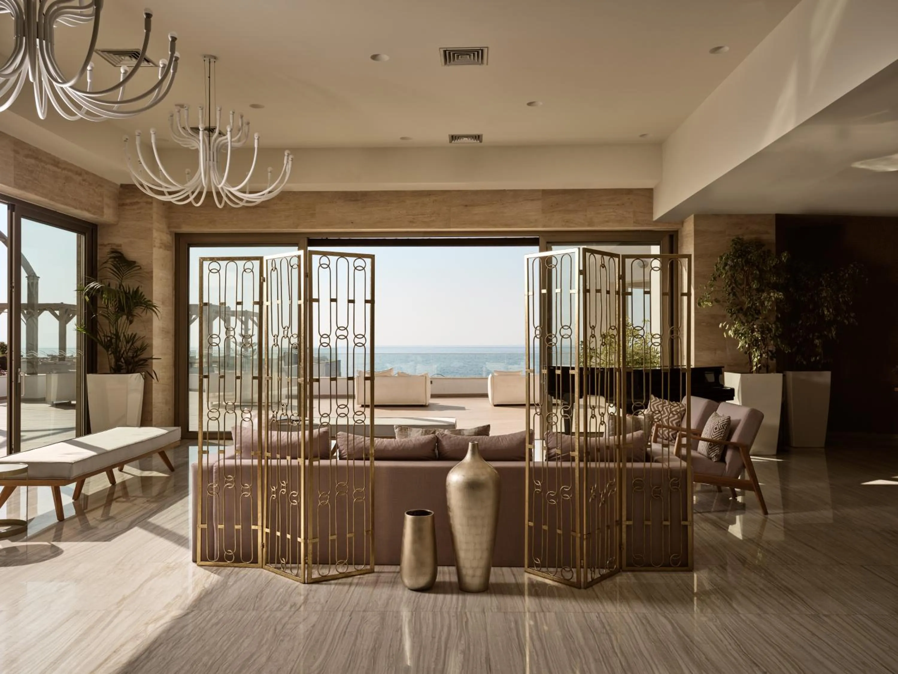 Lobby or reception in The Royal Blue a Luxury Beach Resort