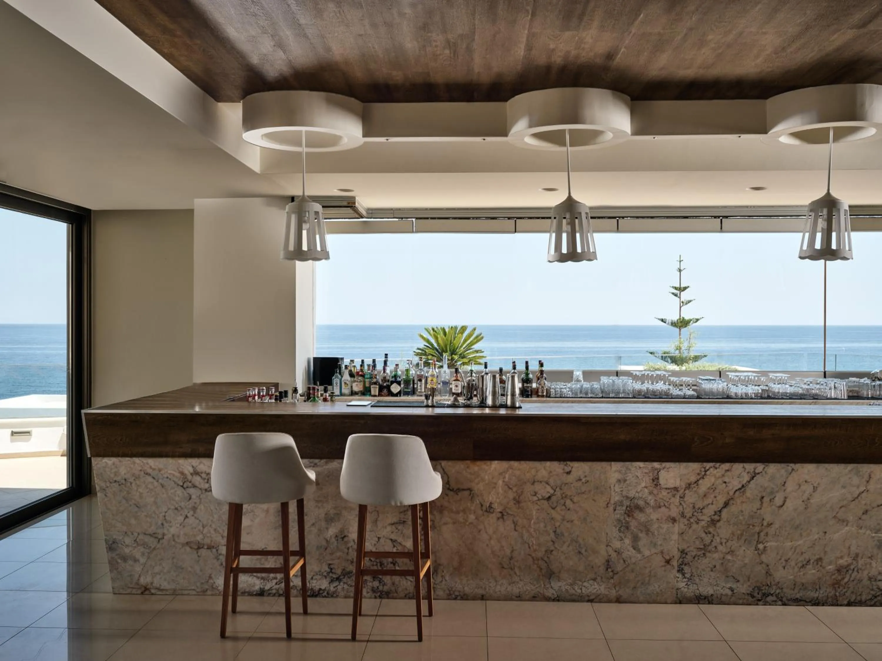 Lounge or bar in The Royal Blue a Luxury Beach Resort