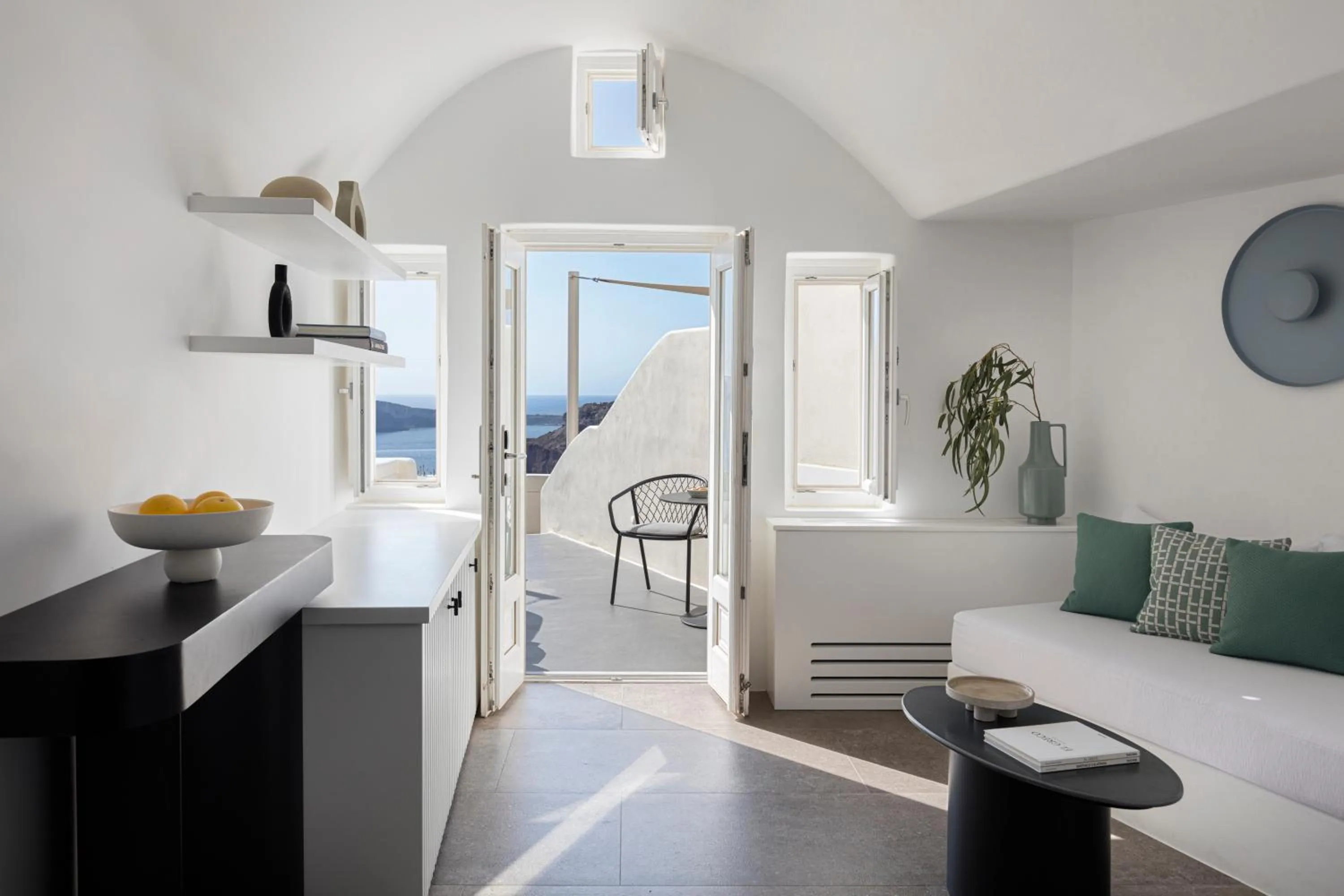 Living room, Bed in Canaves Oia Suites - Small Luxury Hotels of the World