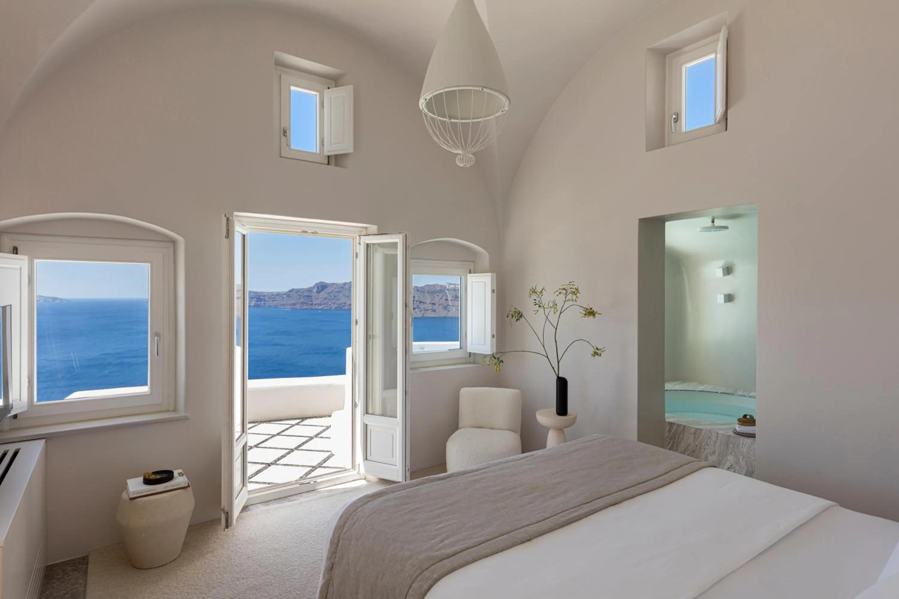 Photo of the whole room, Bed in Canaves Oia Suites - Small Luxury Hotels of the World