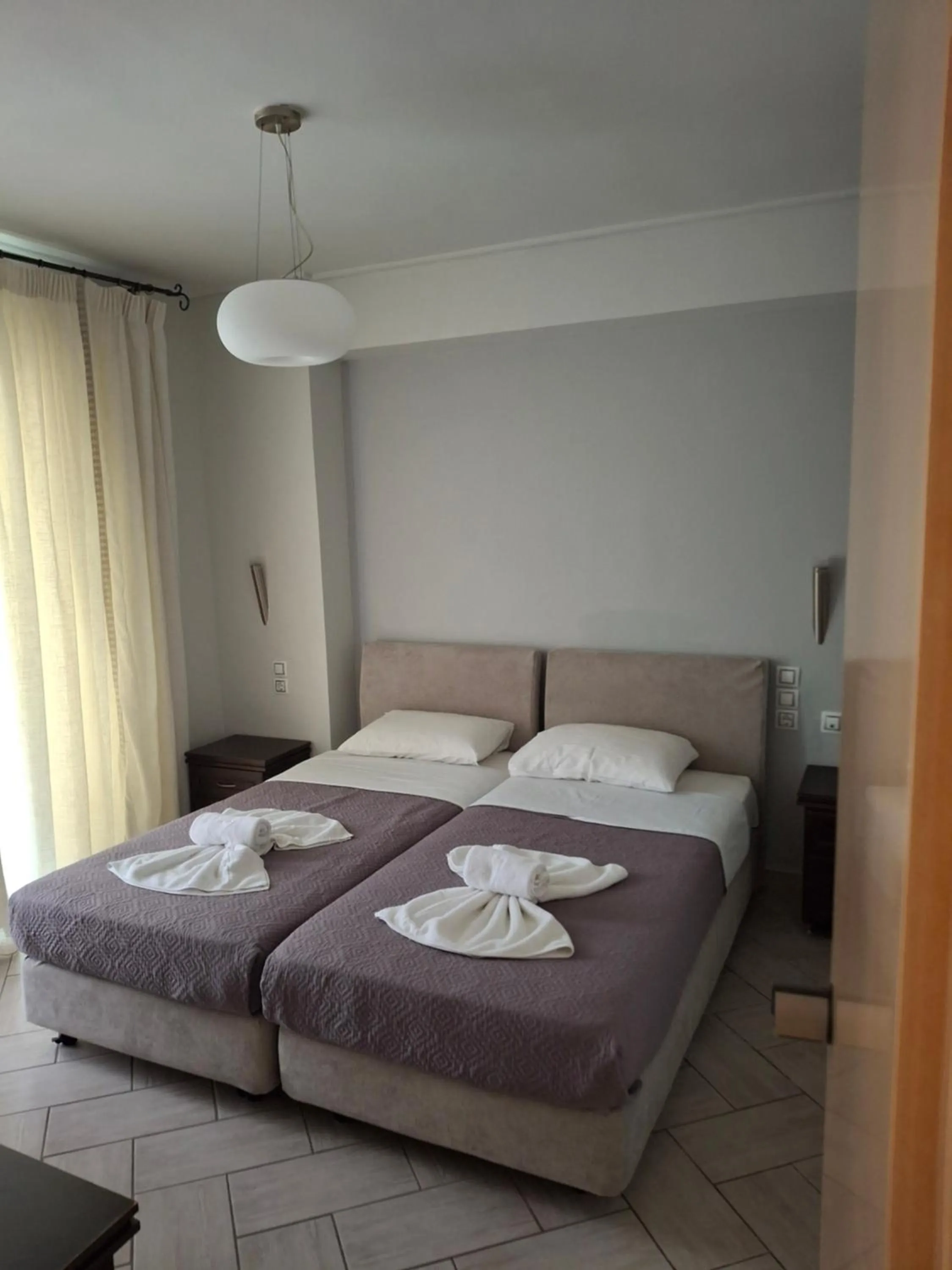 Bed in Palmyra Hotel