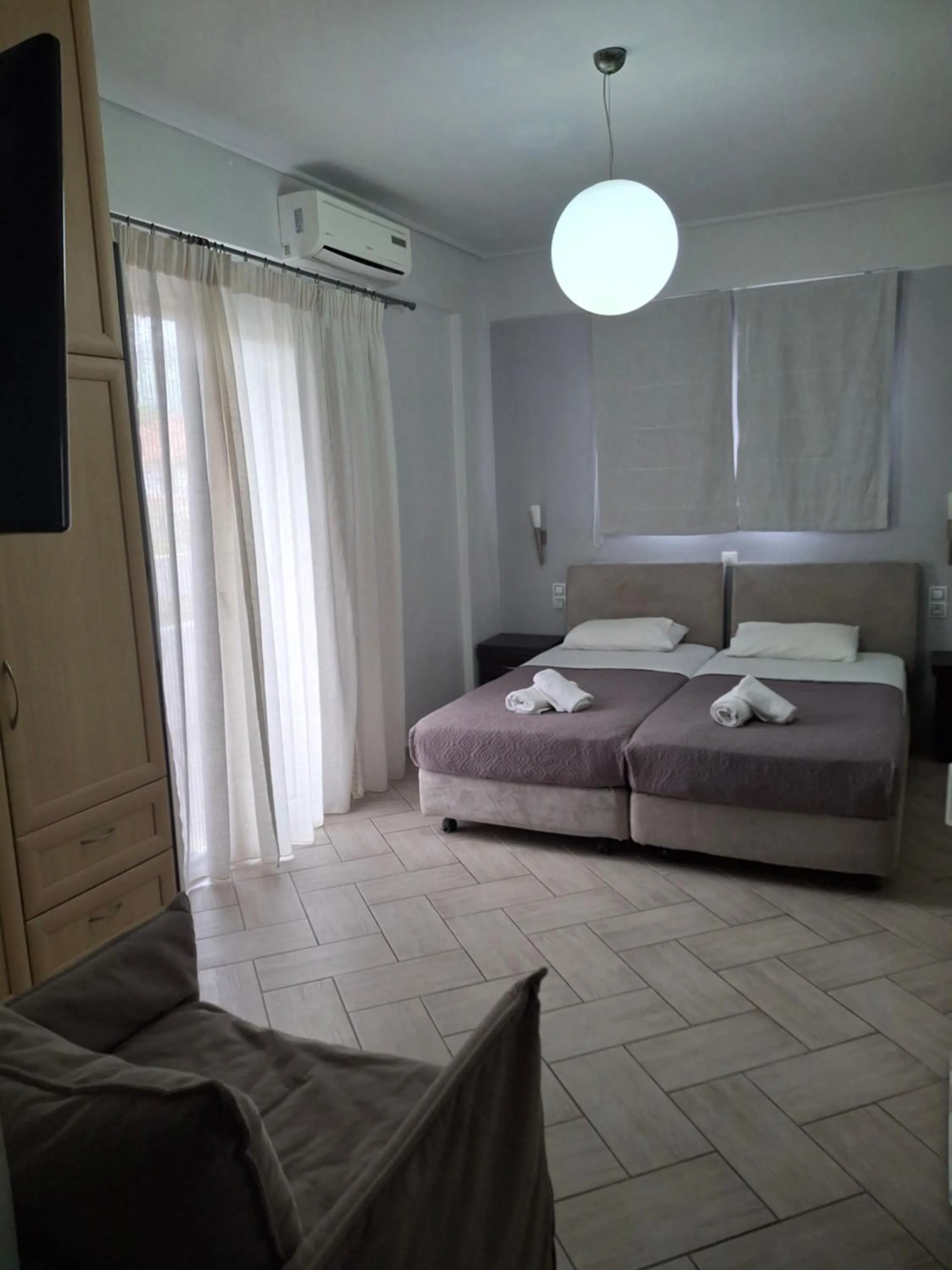 Bed in Palmyra Hotel