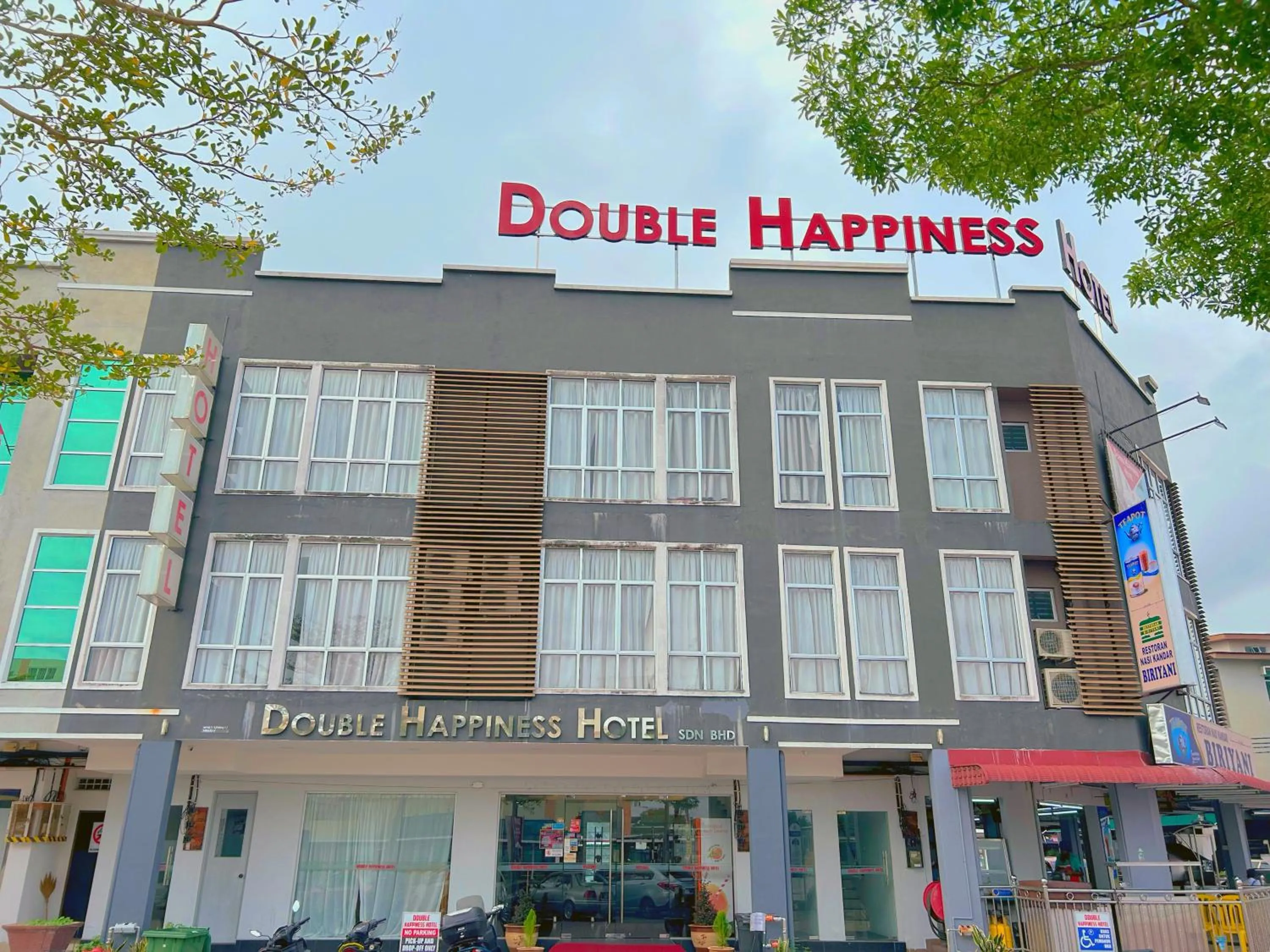 Property building in Double Happiness Hotel