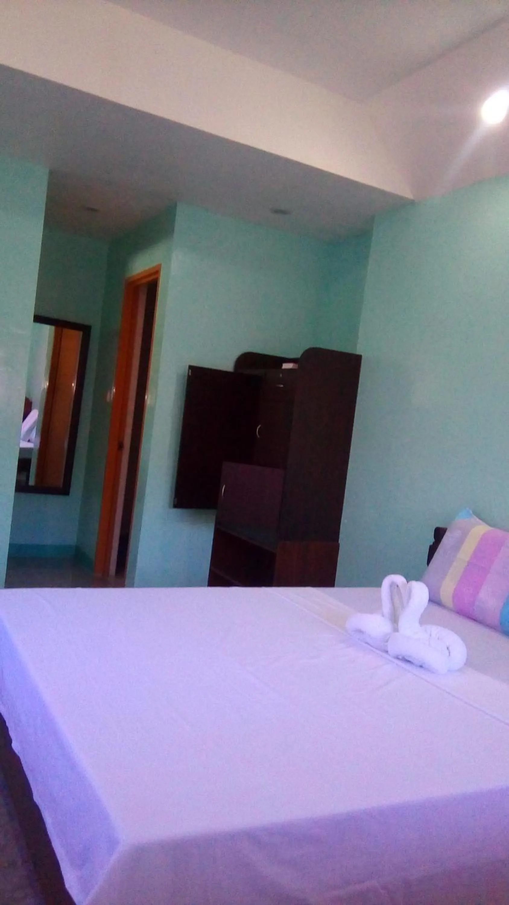 Bed in SUNSHINE PARADISE Inn