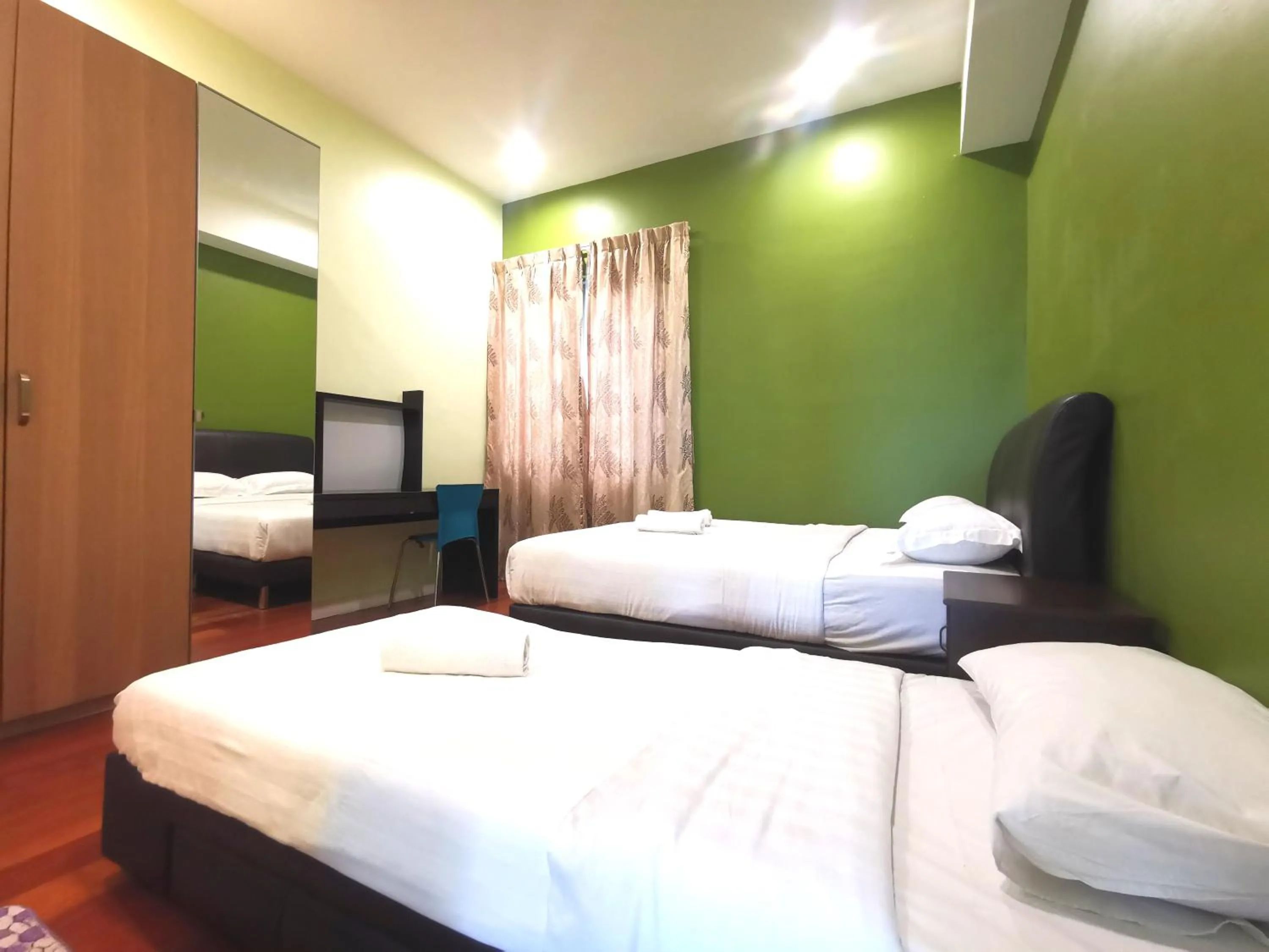 Bed in Sunset Seaview Vacation Condos @ IMAGO Shopping Mall