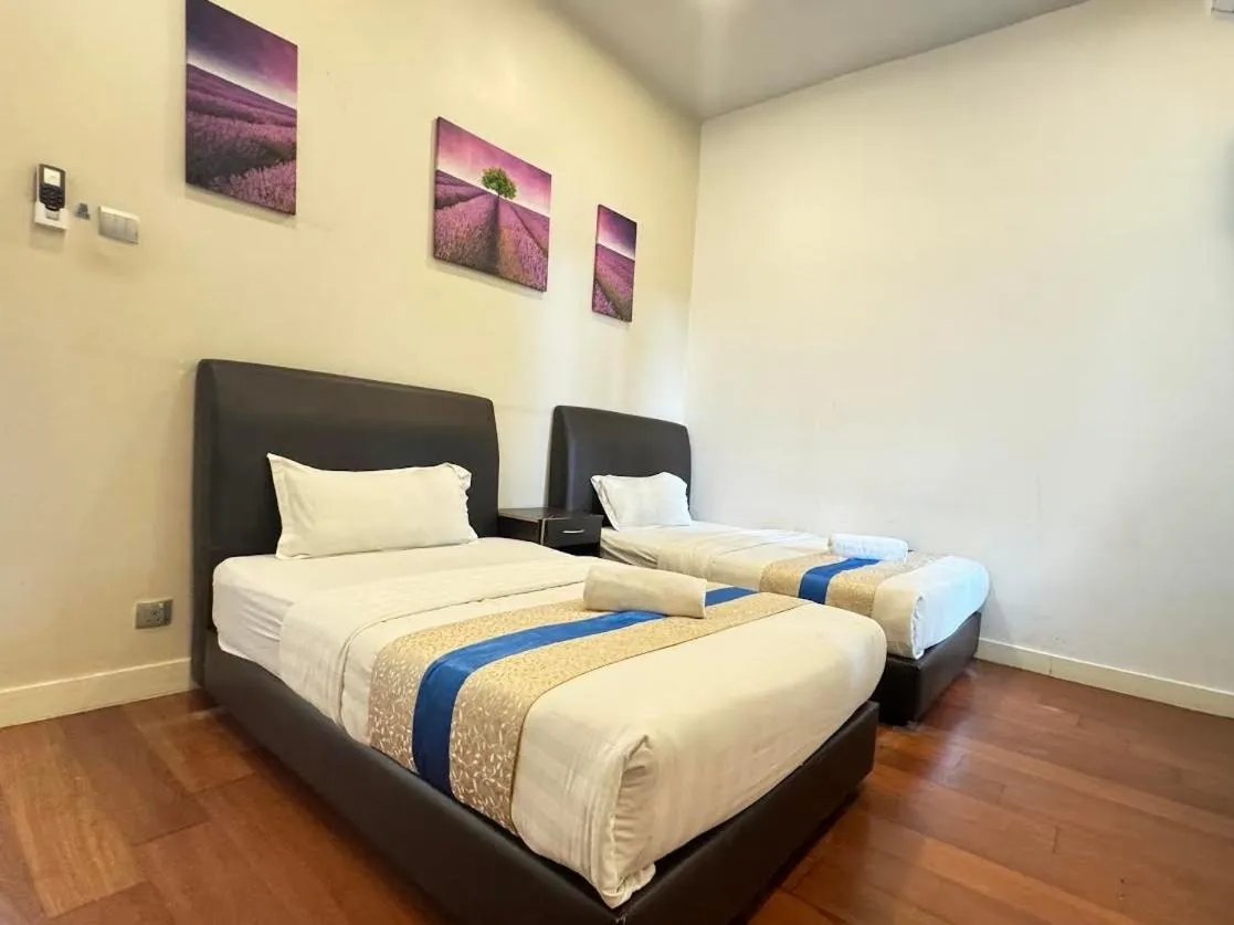 Bed in Sunset Seaview Vacation Condos @ IMAGO Shopping Mall
