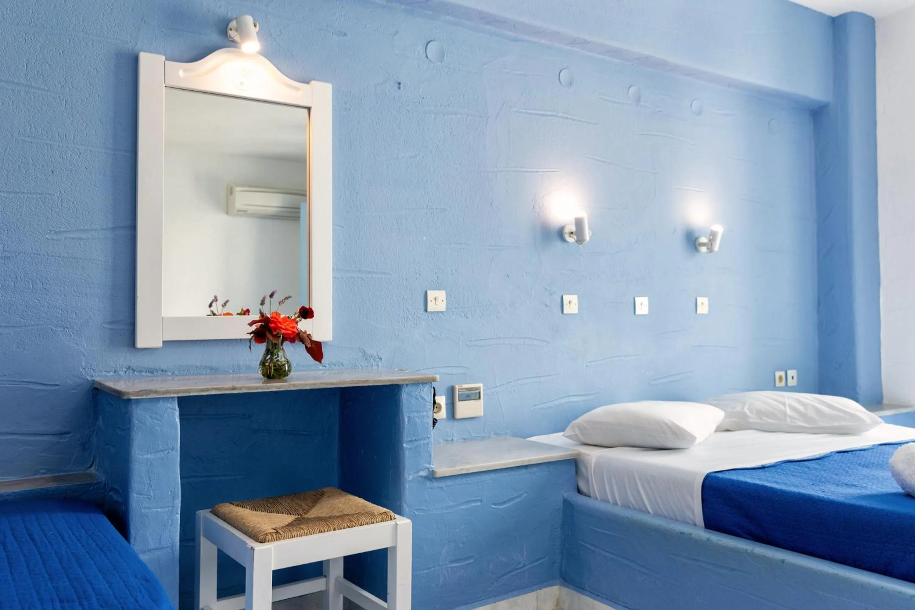 Bed in Stratos Apartments & Studios