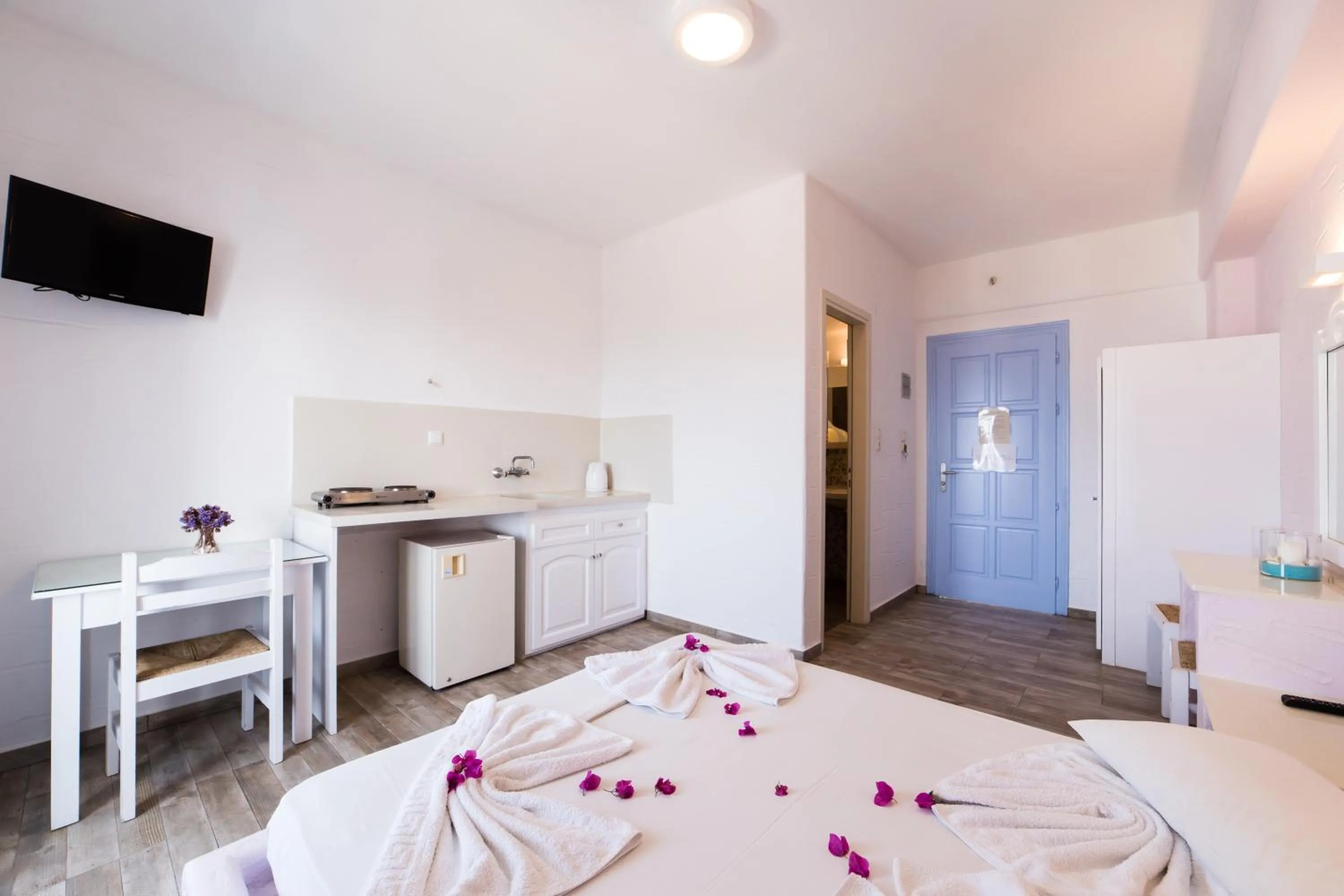 Bed in Stratos Apartments & Studios