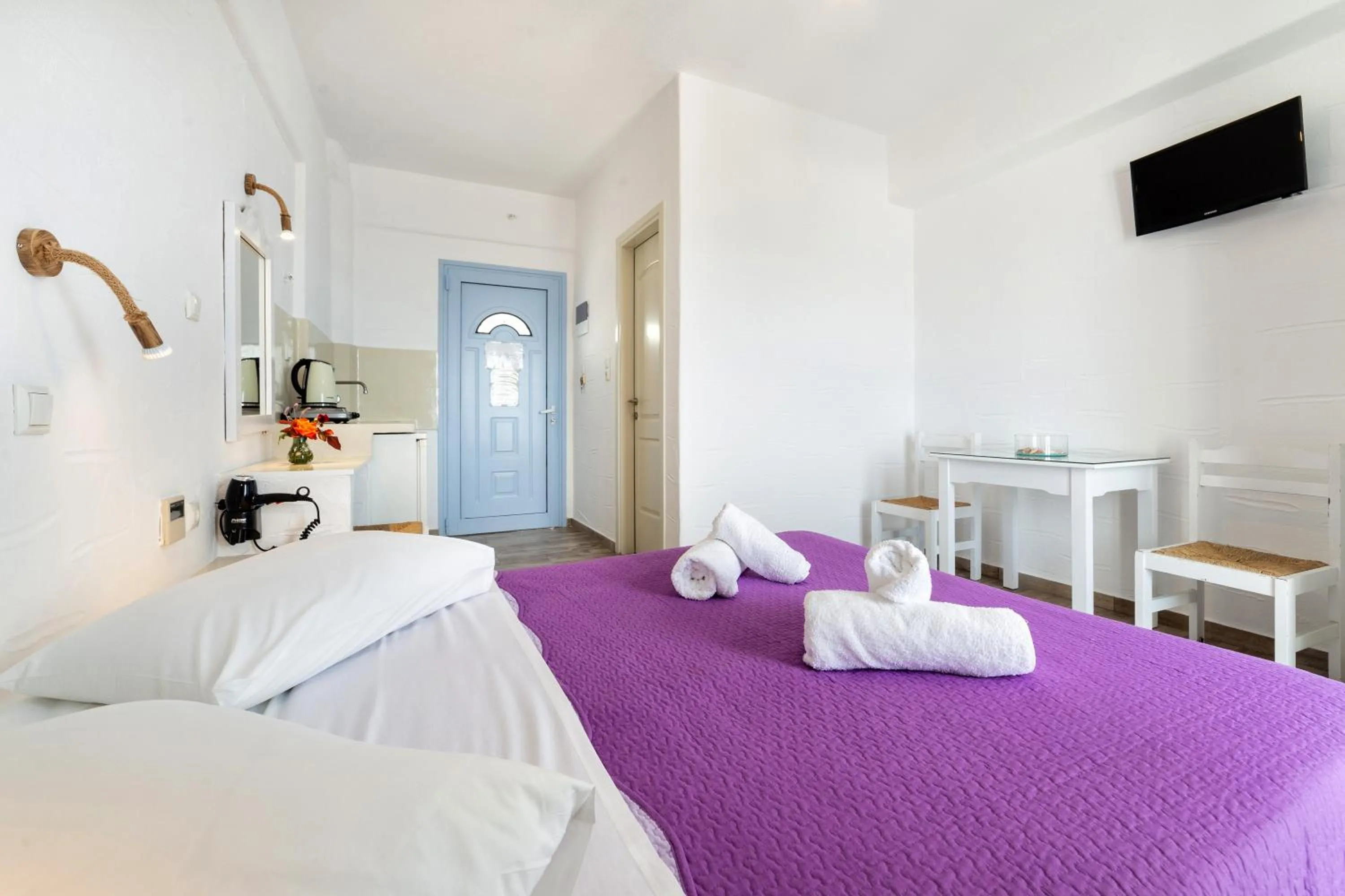 Bed in Stratos Apartments & Studios